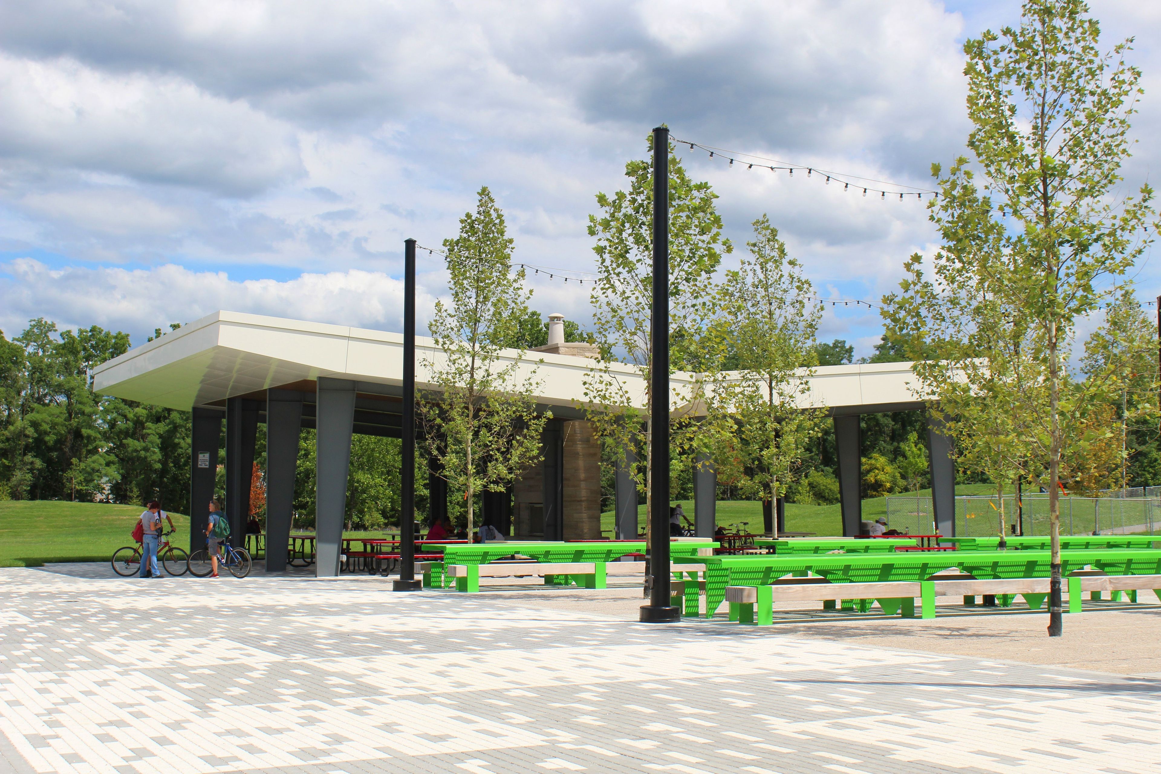 Bosque seating area and picnic shelter at Switchyard Park