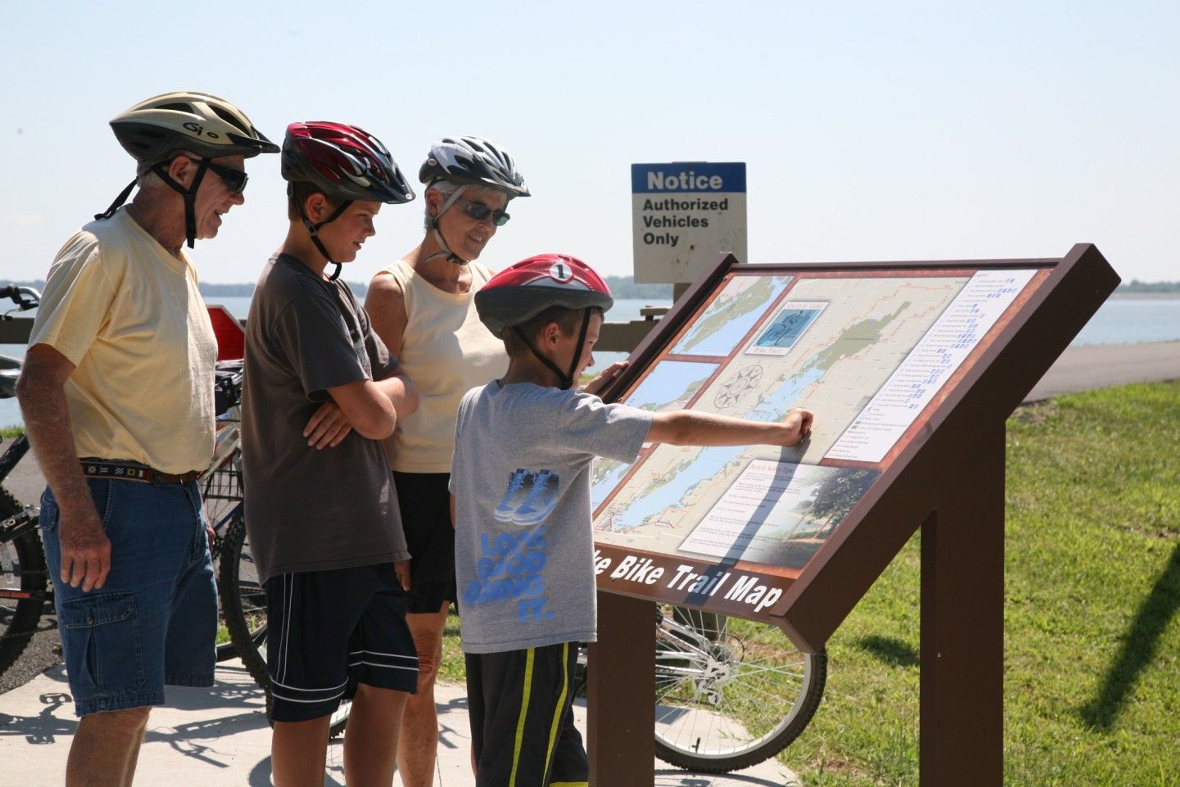 Bicyclist stop to view the Carlyle Lake Bike Trail