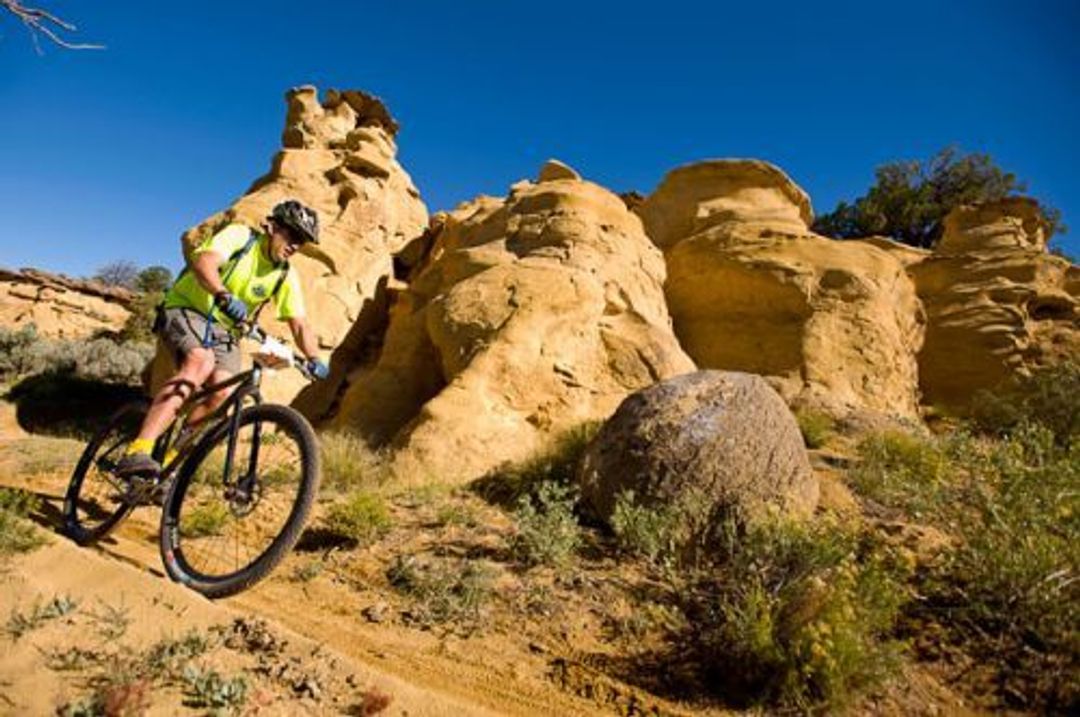 Paul DeWitt, rider passes one of the many formations on the High Desert Trail System during the High Desert Screamer.