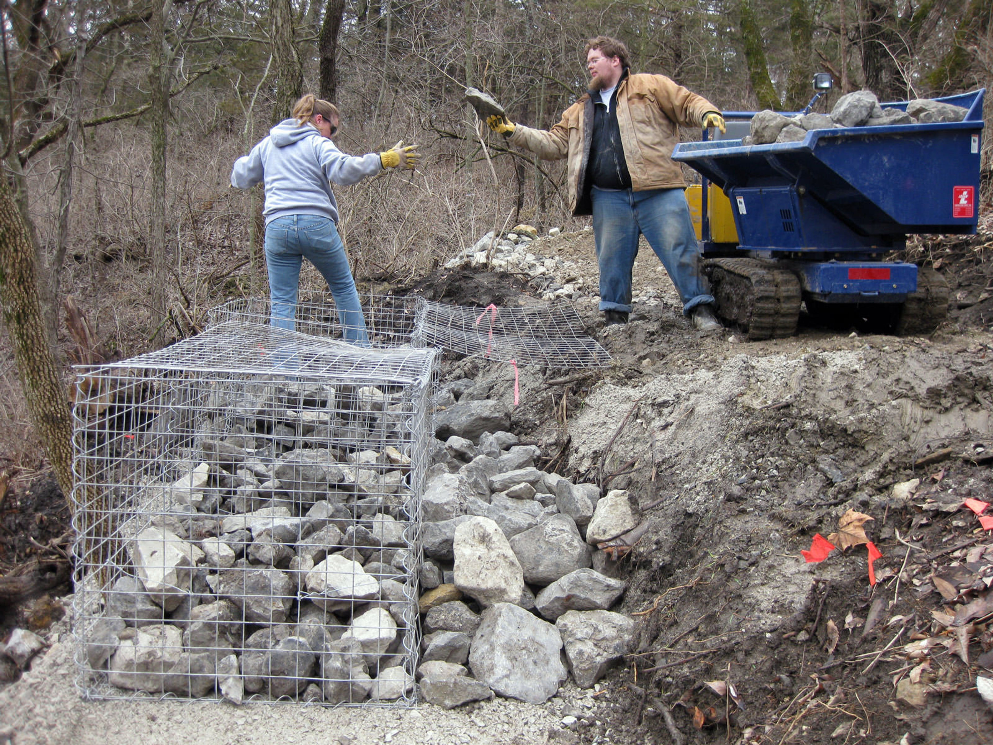 Building a rock gabion wall along the trail. Photo by Kansas DWPT.