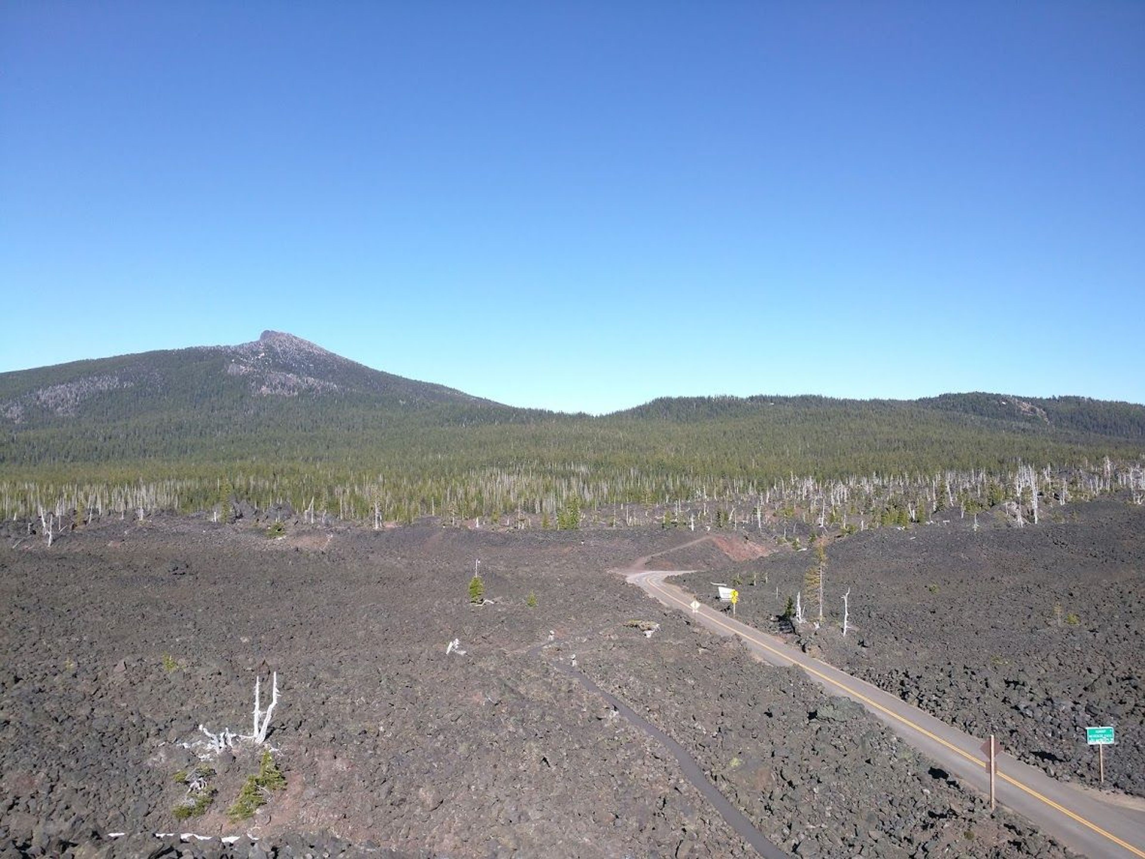 The Lava River Trail winds through a massive lava flow and features many interpretive signs. Photo by Chris Chandler.