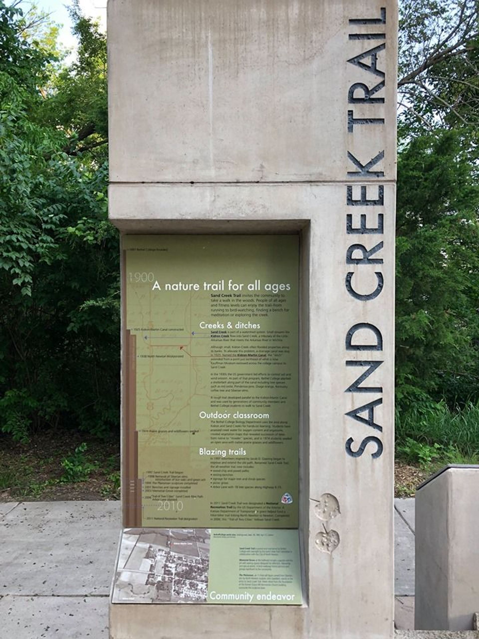 Marker 4  at trailhead of Sand Creek Trail - Bethel College Memorial Grove. Photo by City of North Newton.