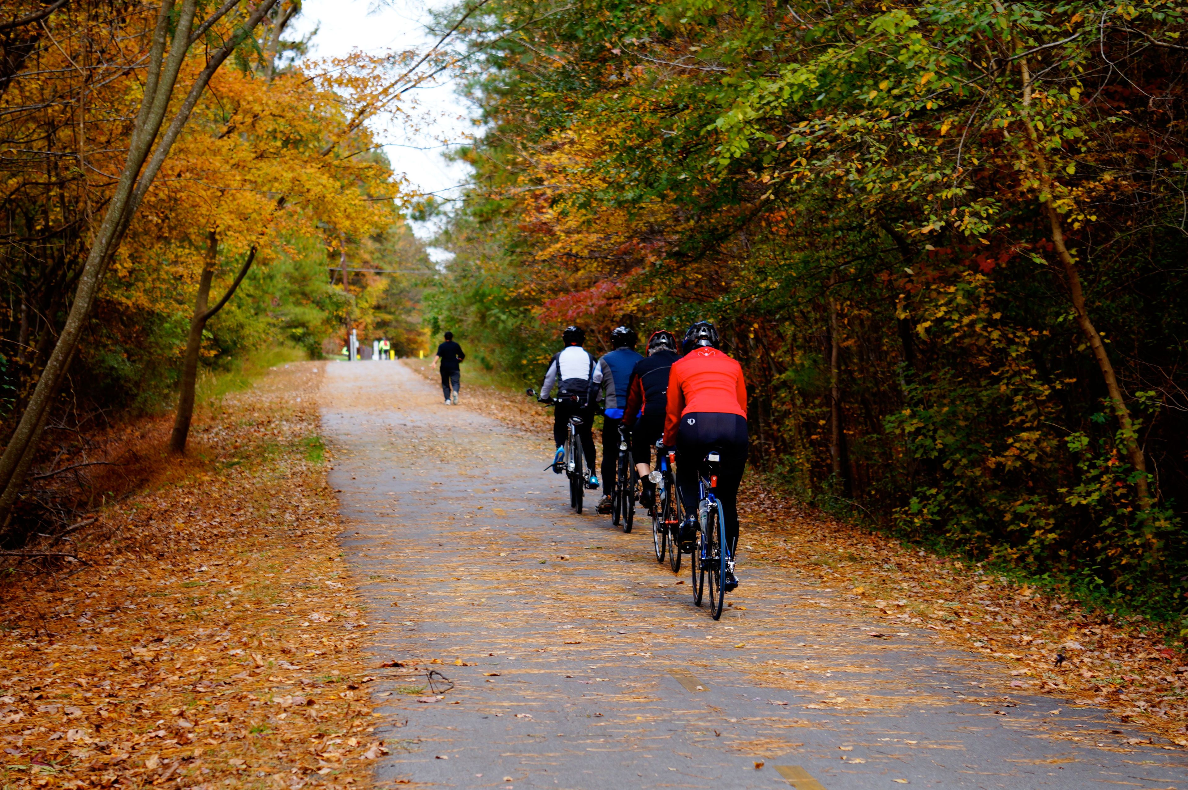 Bike racing and running along the trail. Photo by Sarina Lewis.