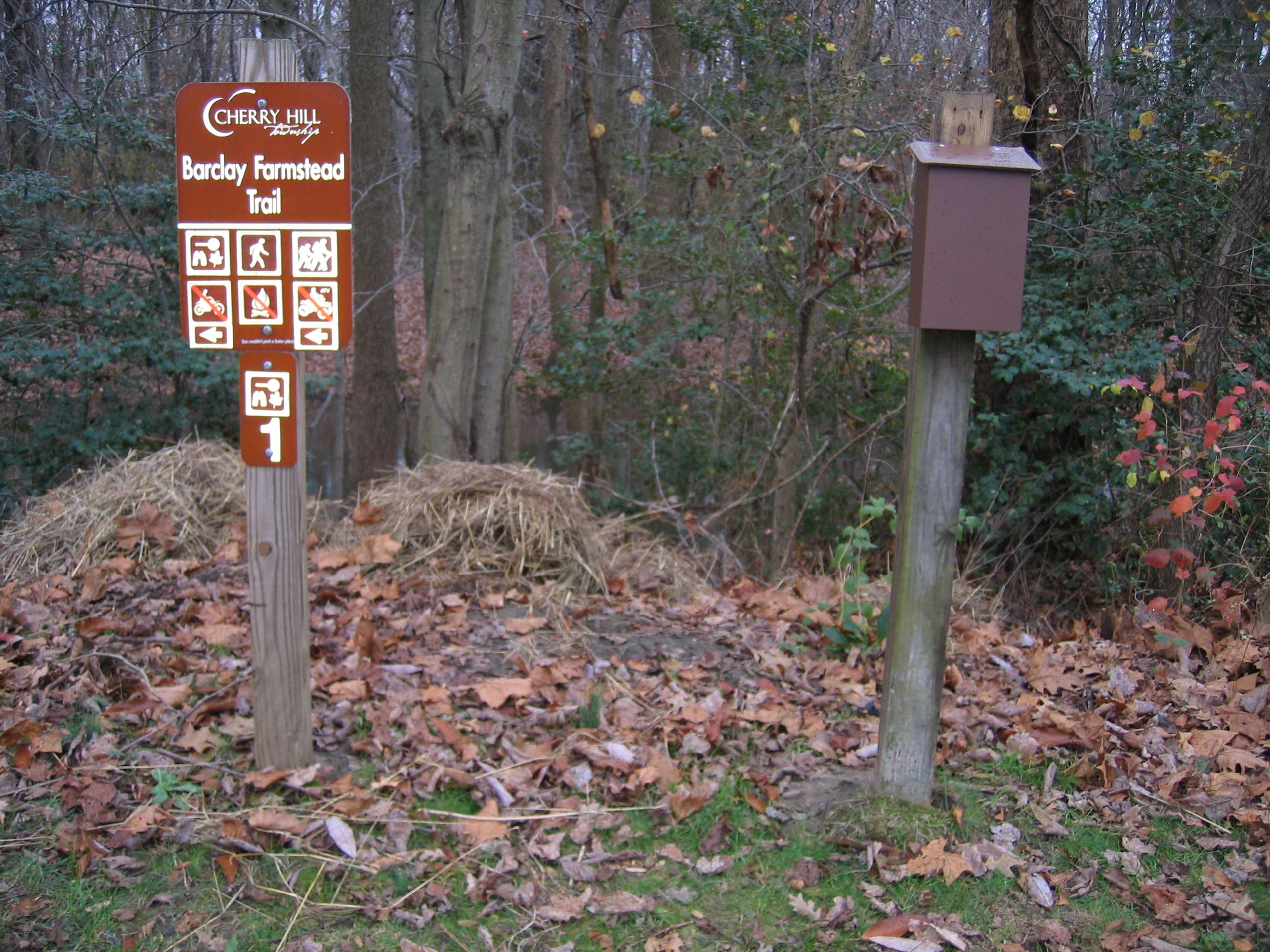 Trailhead showing trail direction and Nature Trail brochure box. Photo by Lew Gorman III.