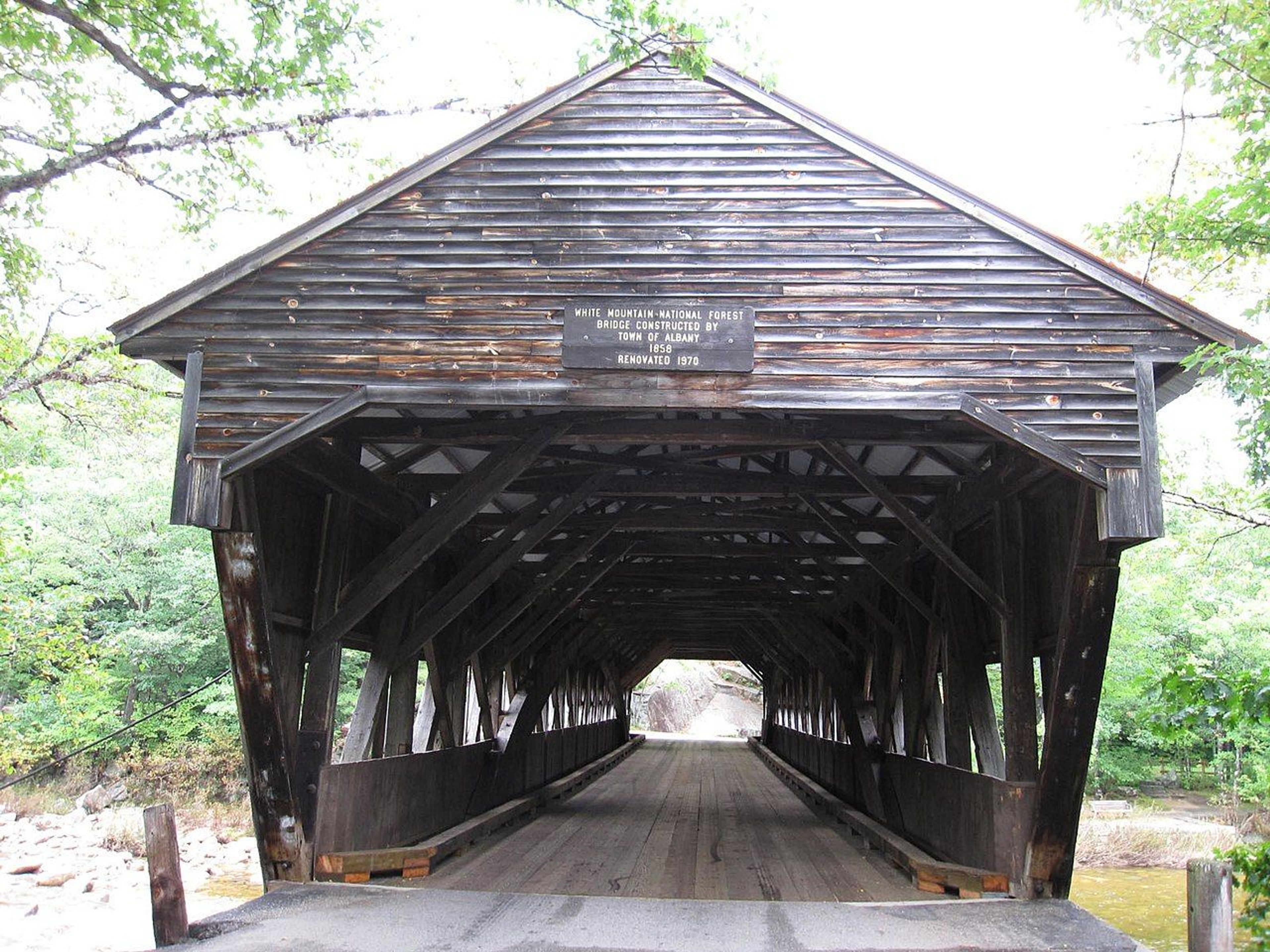 Albany Covered Bridge located in Albany, New Hampshire. Photo by Waz8.