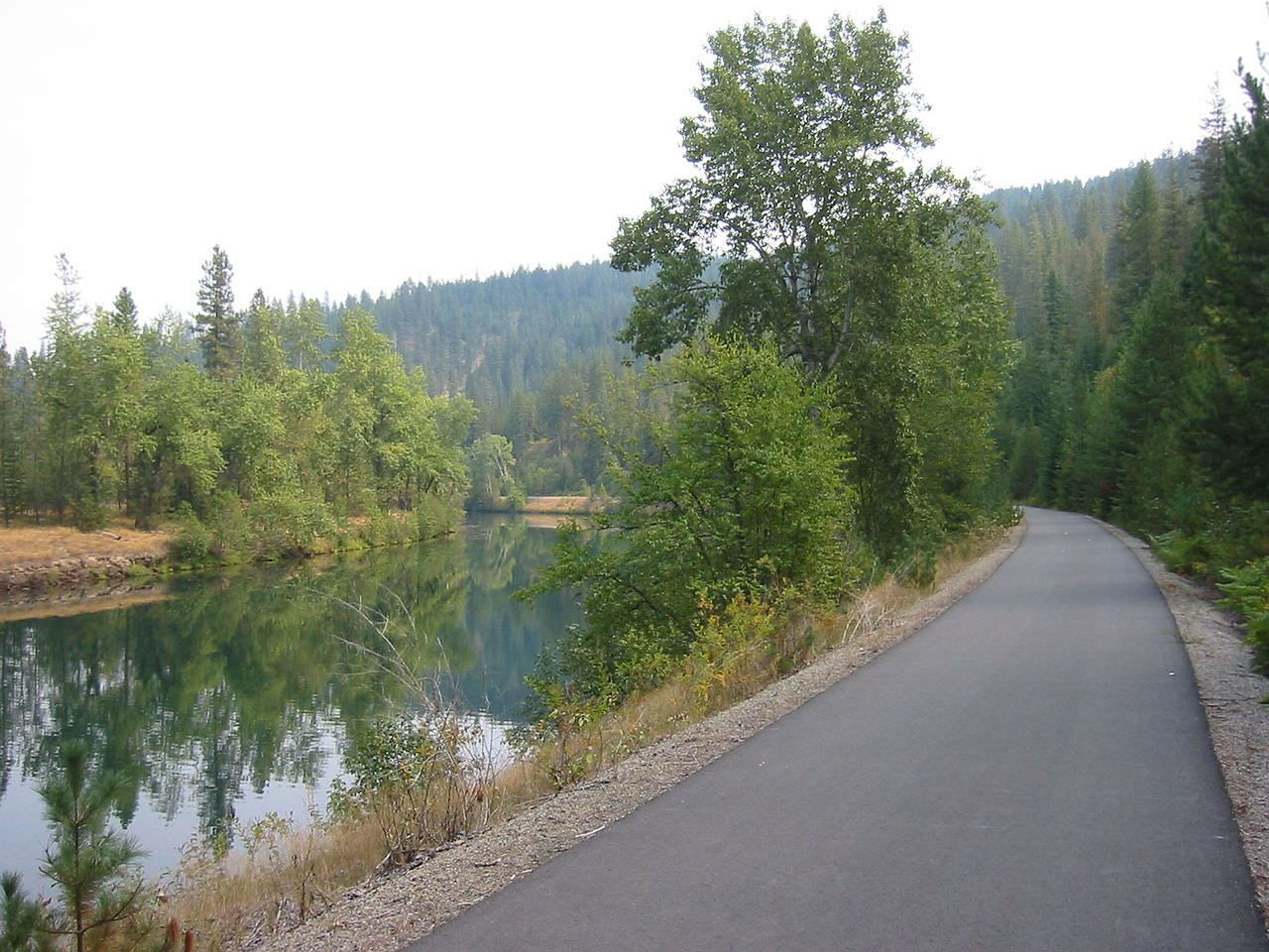 Trail of the Coeur d'Alenes as it follows the river in Idaho. Photo by Todd Murray/wiki.