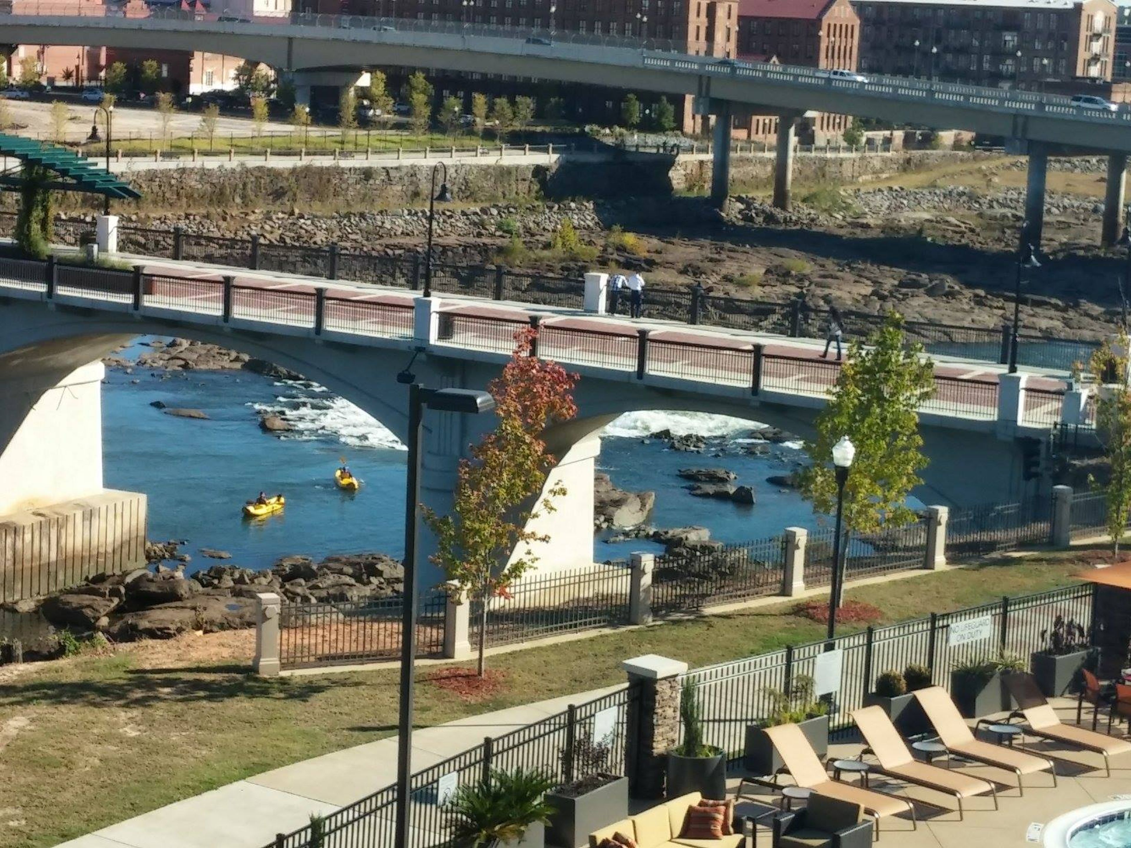 Bike/pedestrian Bridge on NRT trail - kayakers below on the Chattahoochee River. Photo by Tracie Sanchez.