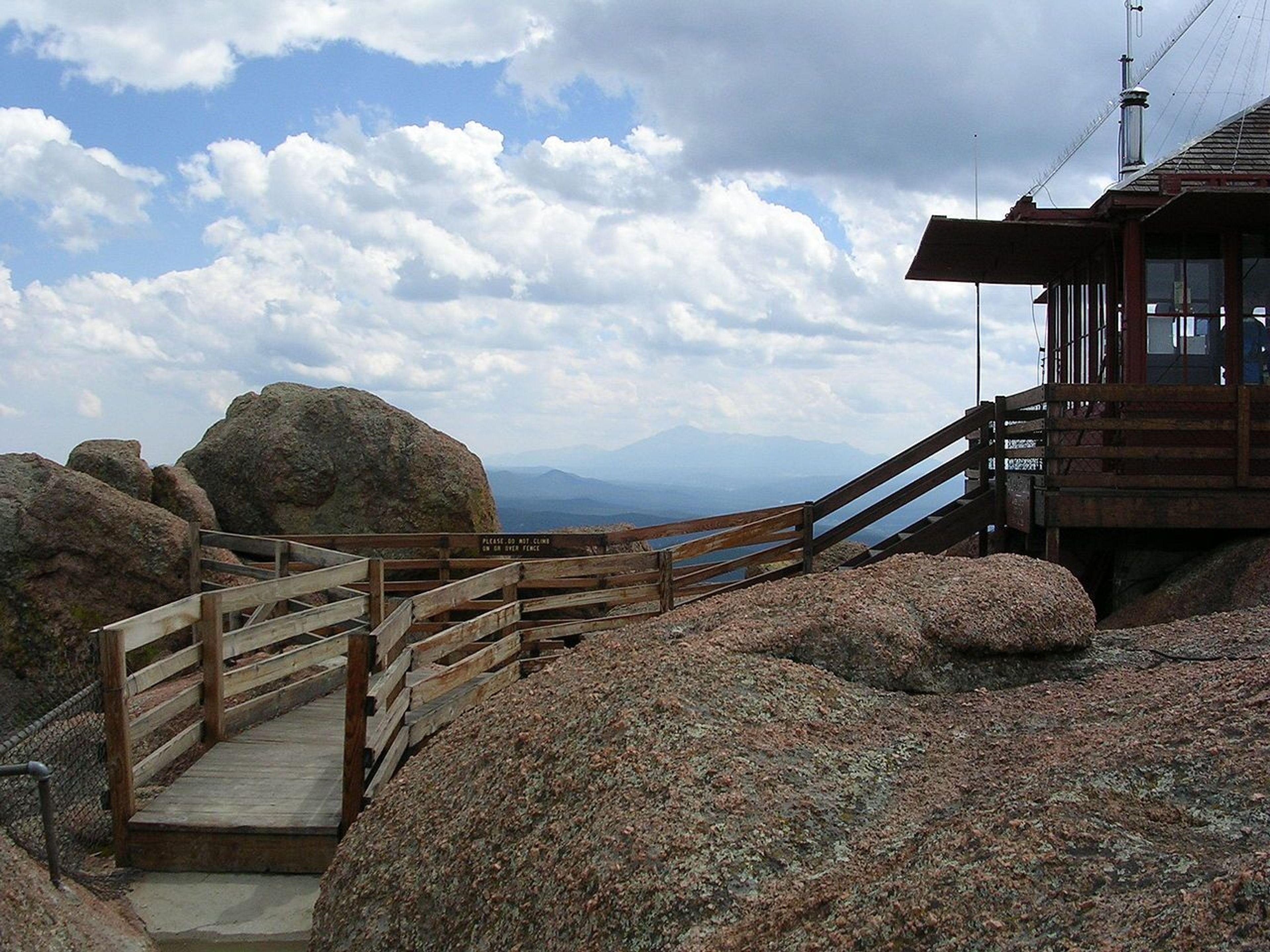 Picture of lookout tower at Devil's Head, Colorado. Pike's Peak is visible in the background. Photo by Glennfcowan/wiki.