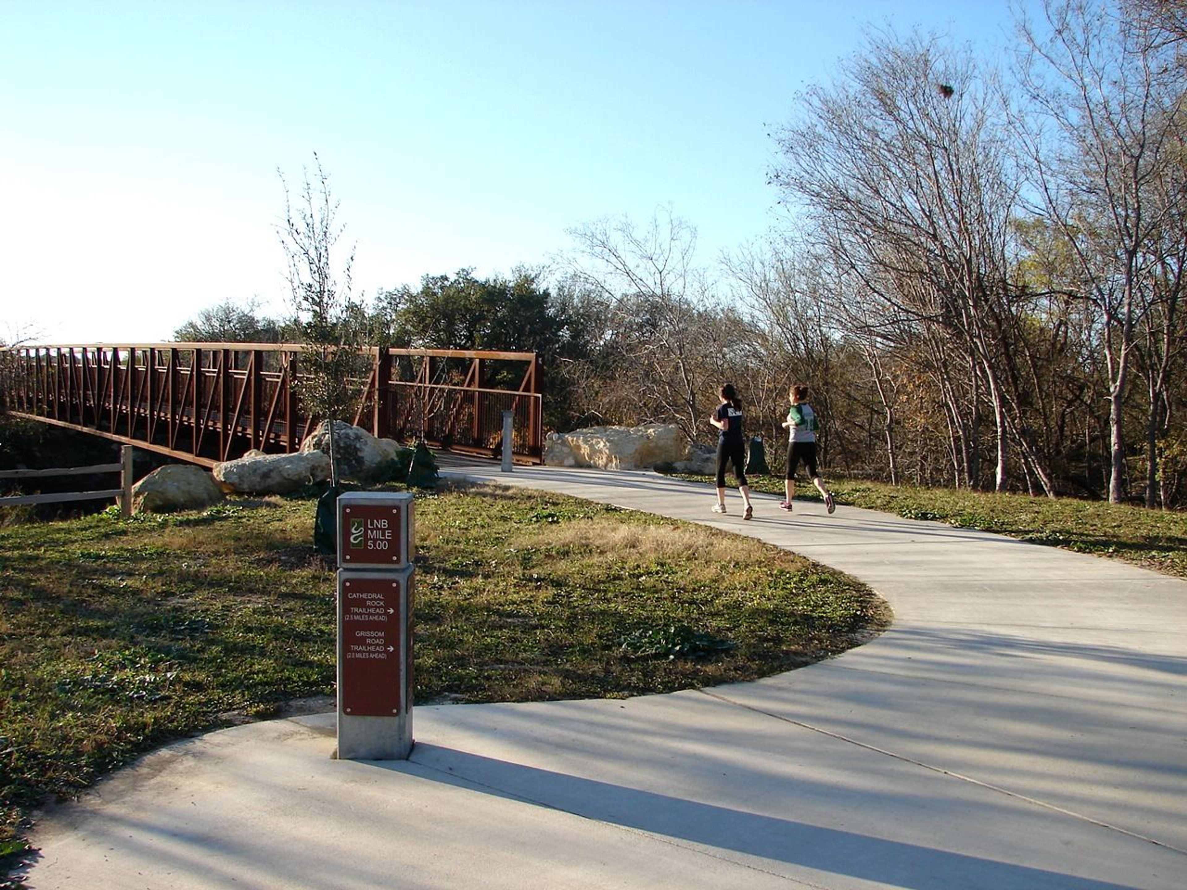 Joggers enjoying a beautiful day on the Leon Creek Greenway near the Via Transit Center Trailhead. Photo by Brandon Ross.