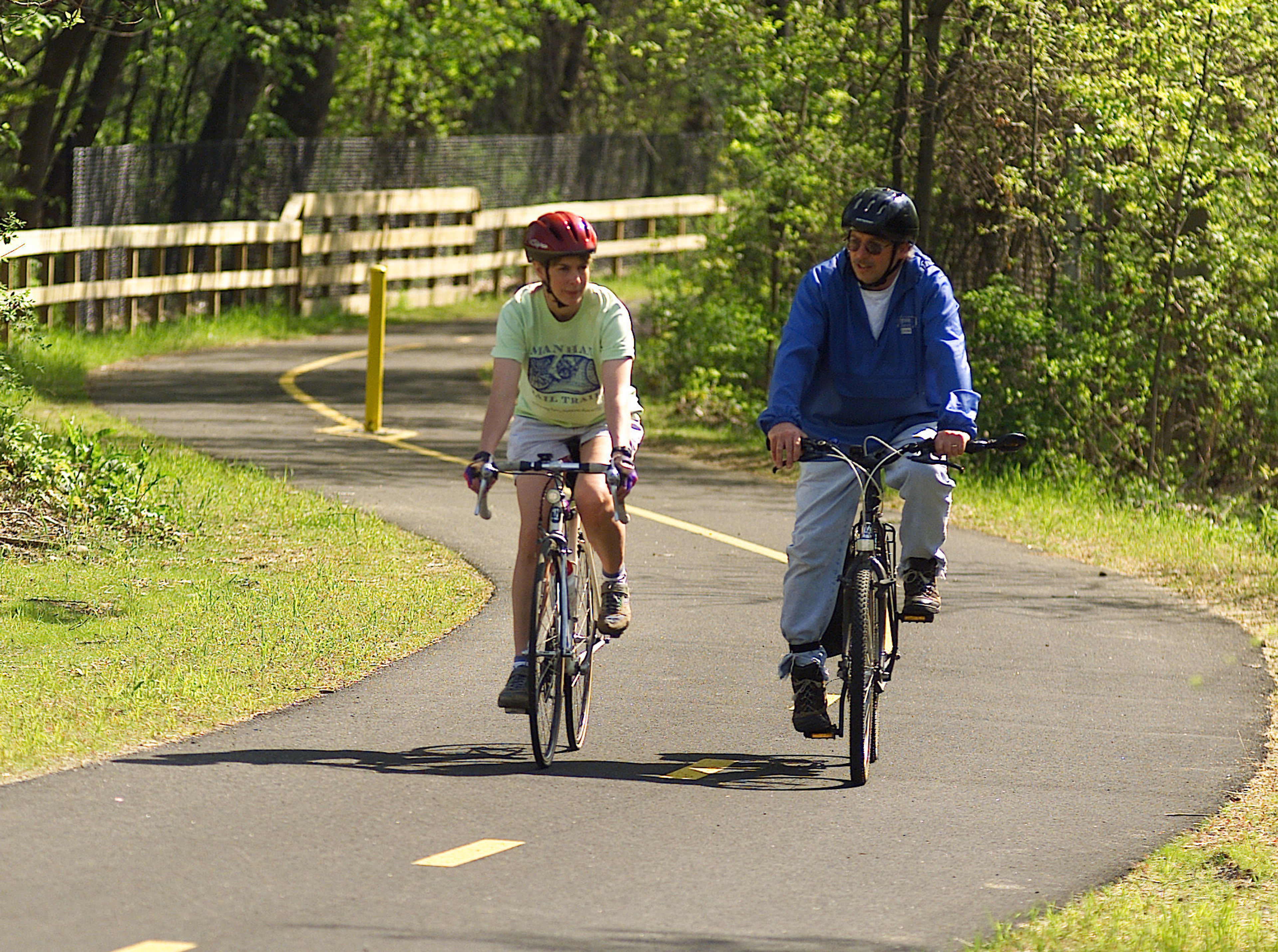 Cyclists enjoy one of the many scenic spots along the Manhan Rail Trail.