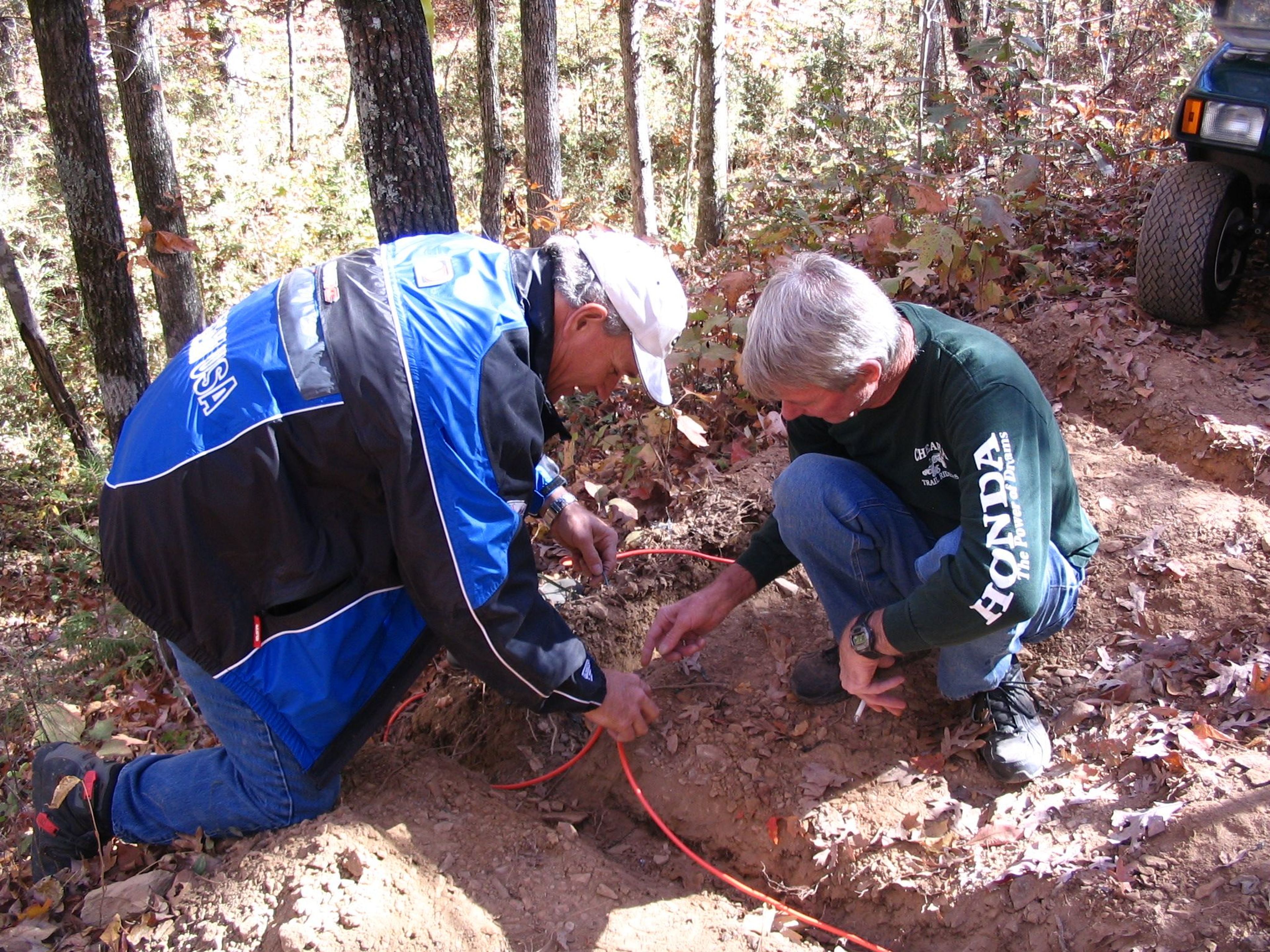 Cheaha Trail Riders installing traffic counters on one of the OHV trails in Minooka Park. Photo by Rob Grant.