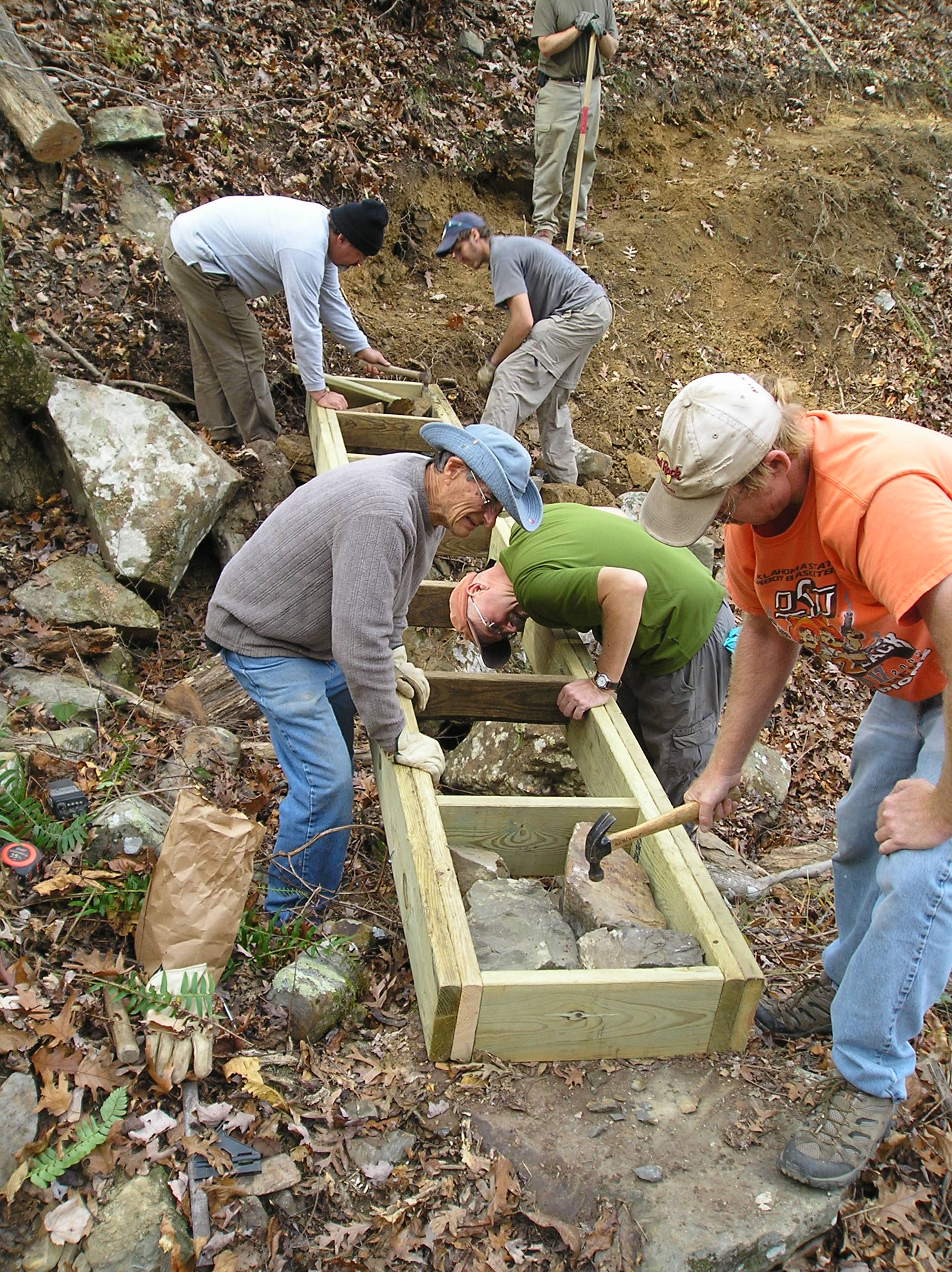 Volunteers building bridges on the Ouachita during the Western End Extravaganza! Photo by Loretta Melancon.