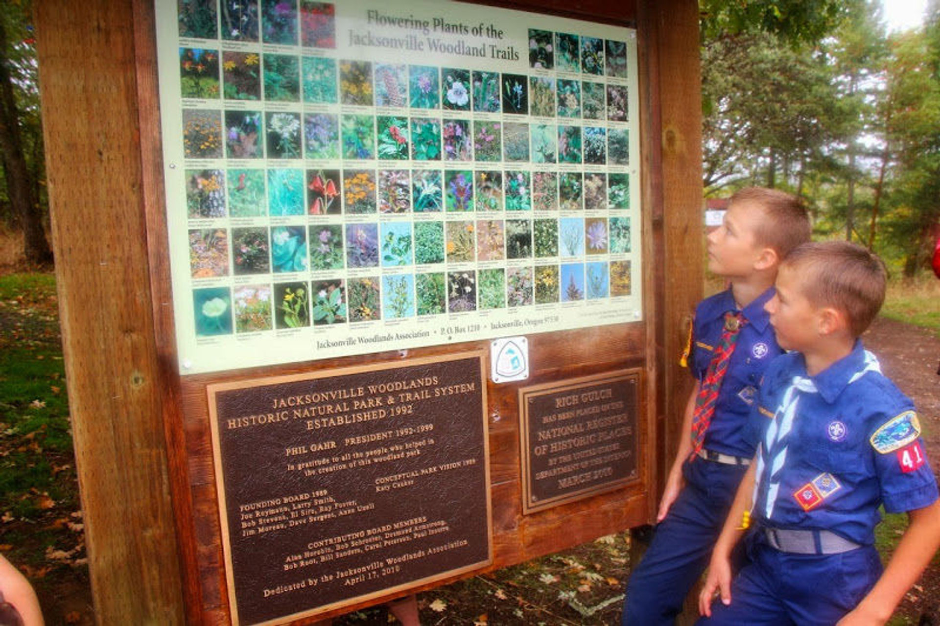 Cub Scouts working on a Tree Identification Badge at the Sarah  Zigler Trailhead. Photo by Larry B. Smith.