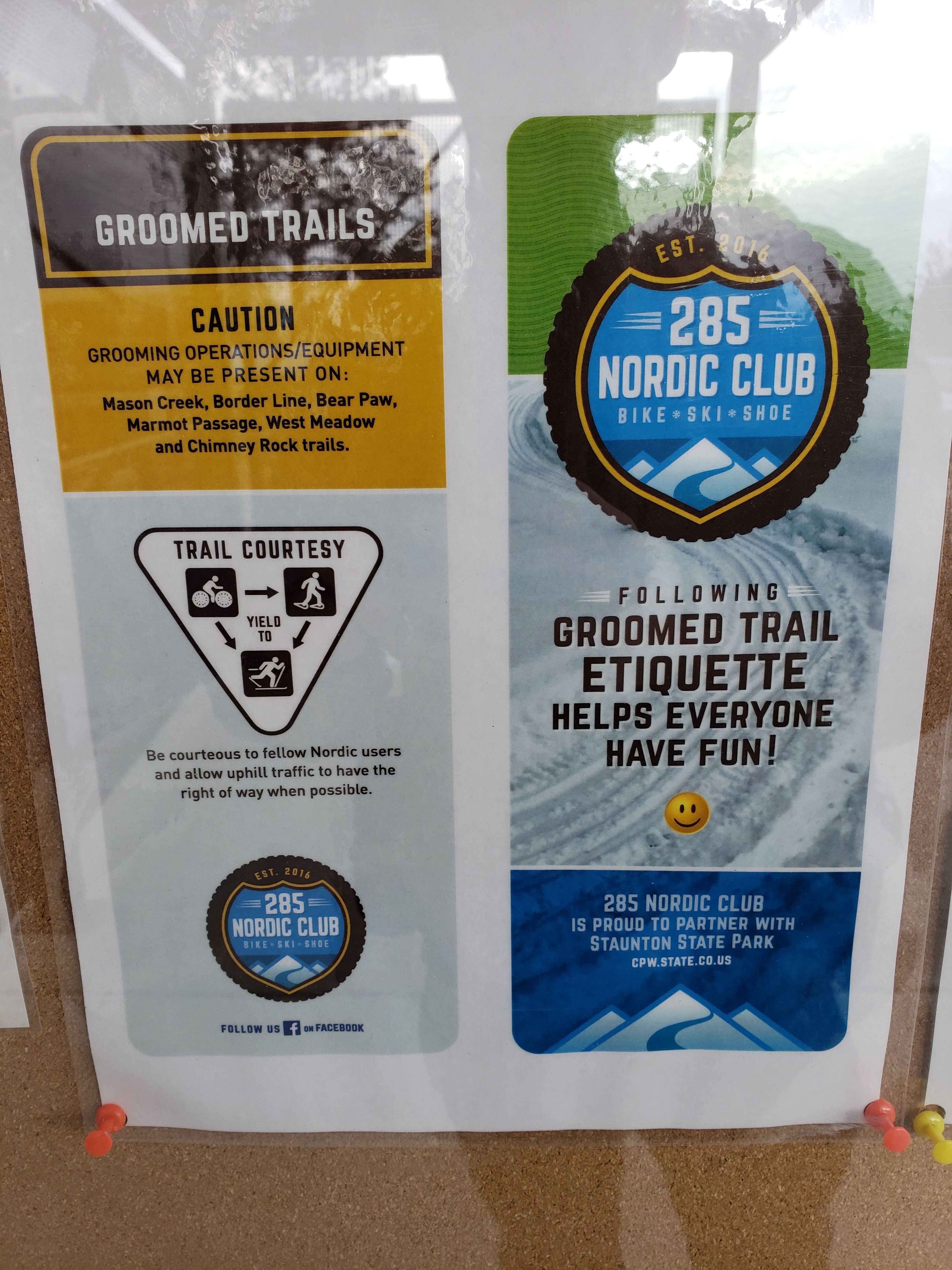 This photo is of the signage posted on the trailhead kiosk that explains trail etiquette for the winter months when snow is present on the trails.