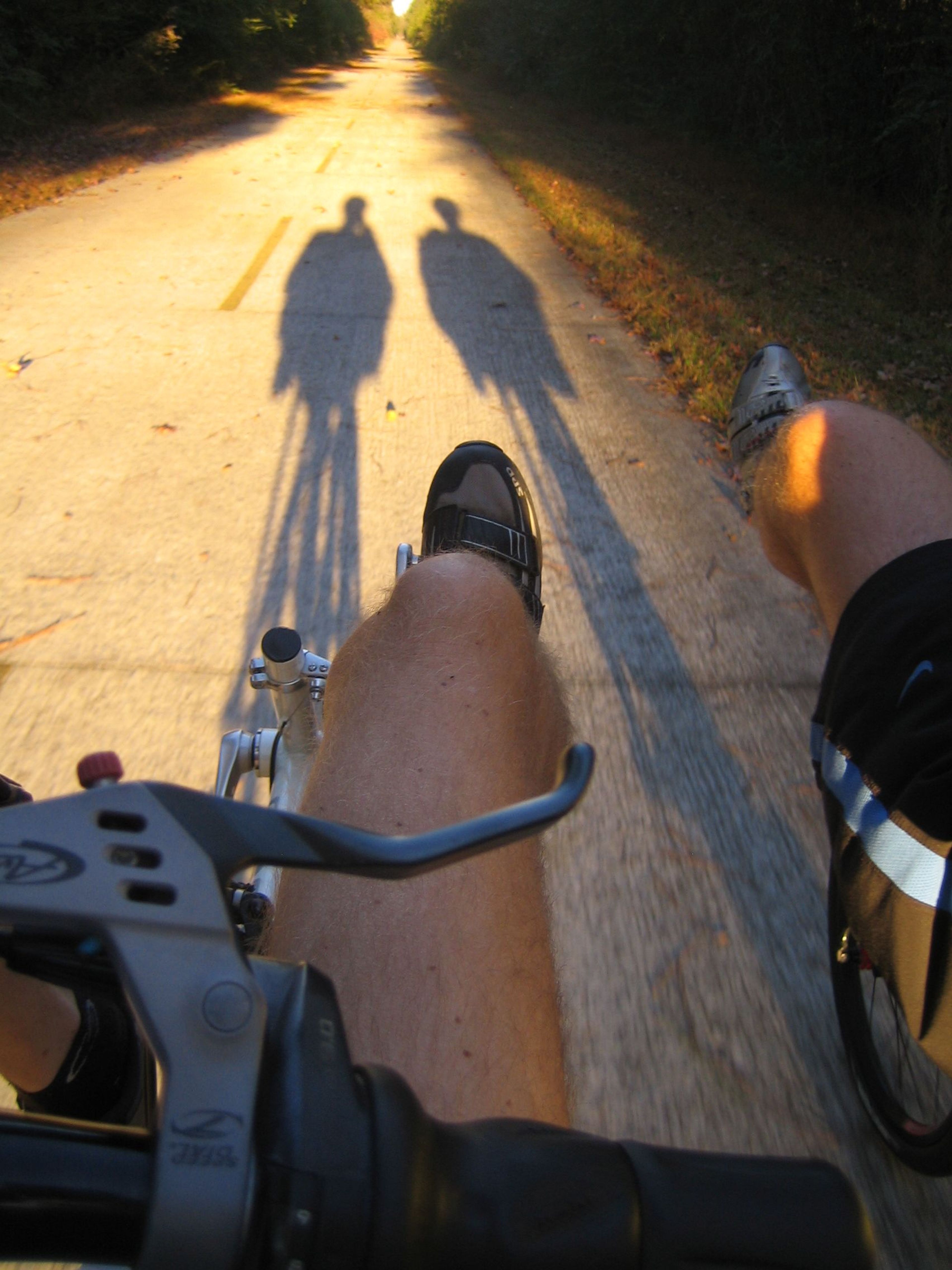 Two recumbent riders coming back in late in the evening on the Silver Comet Trail near Cedartown, GA. Photo by Don Sullivan.