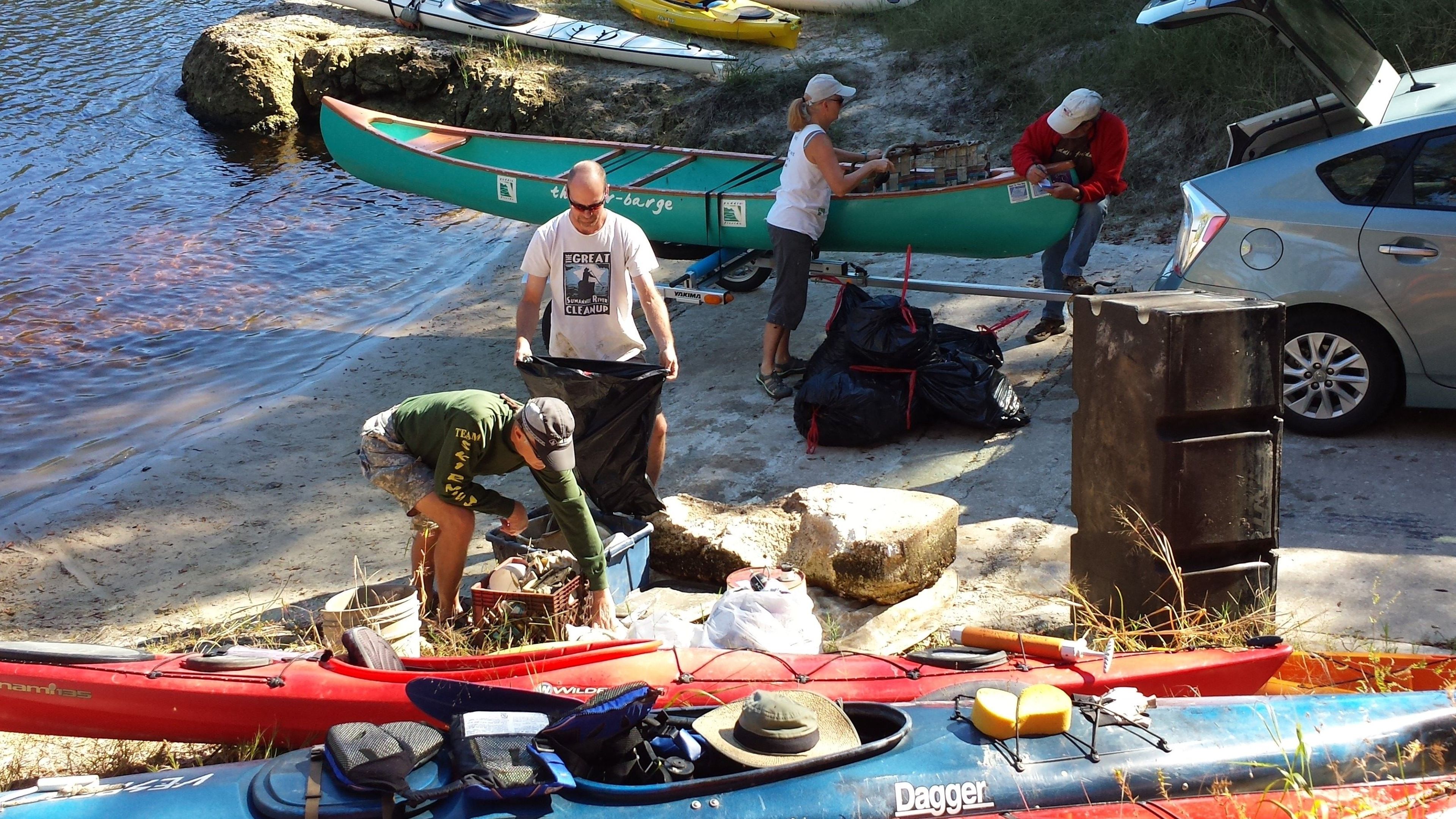 Hundreds of volunteers join non-profit organization Current Problems to clean up tons of garbage during annual cleanup events along the river