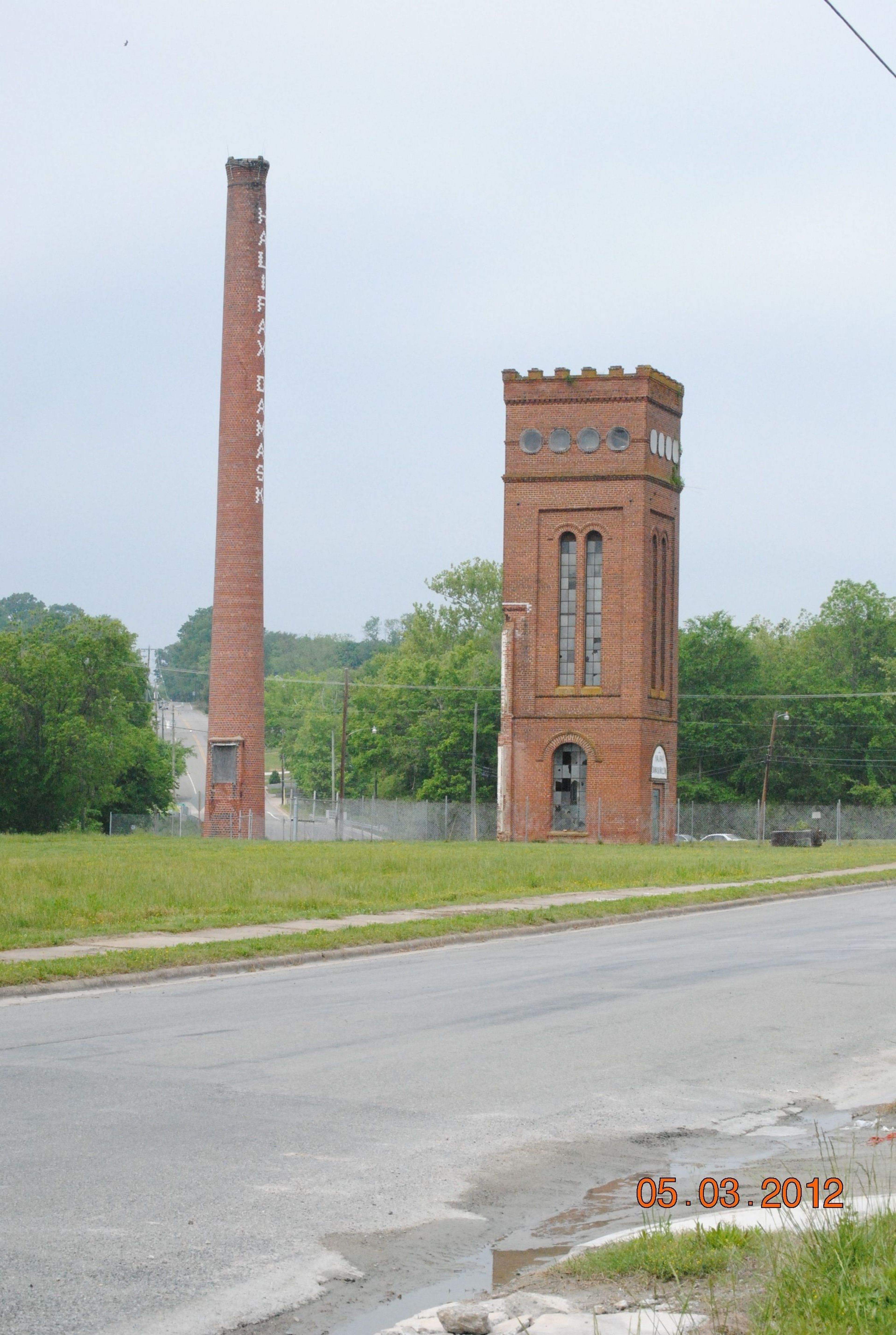 Historic cotton mill structures at the trailhead