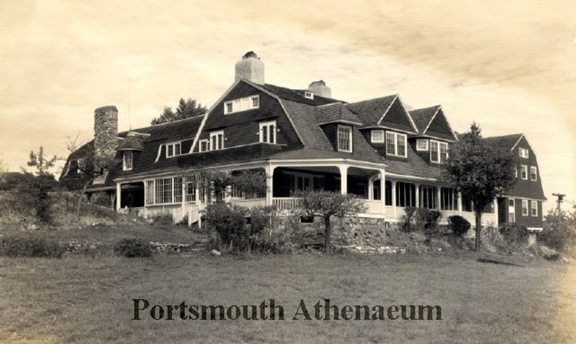 A black and white photo of the Carey Cottage.