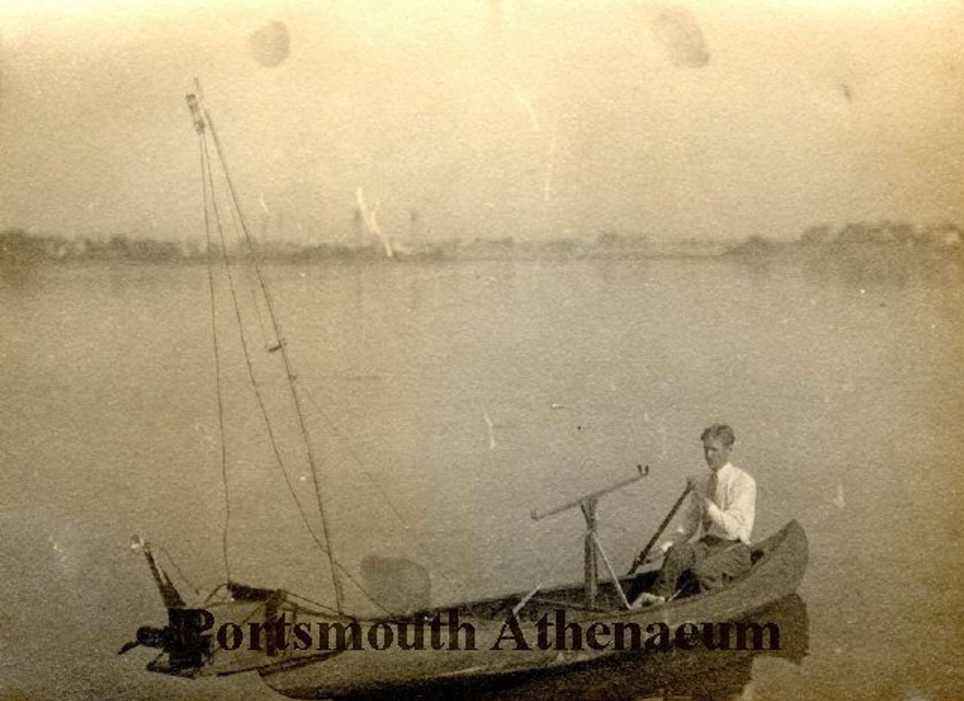 A photo of a fisherman a century ago.