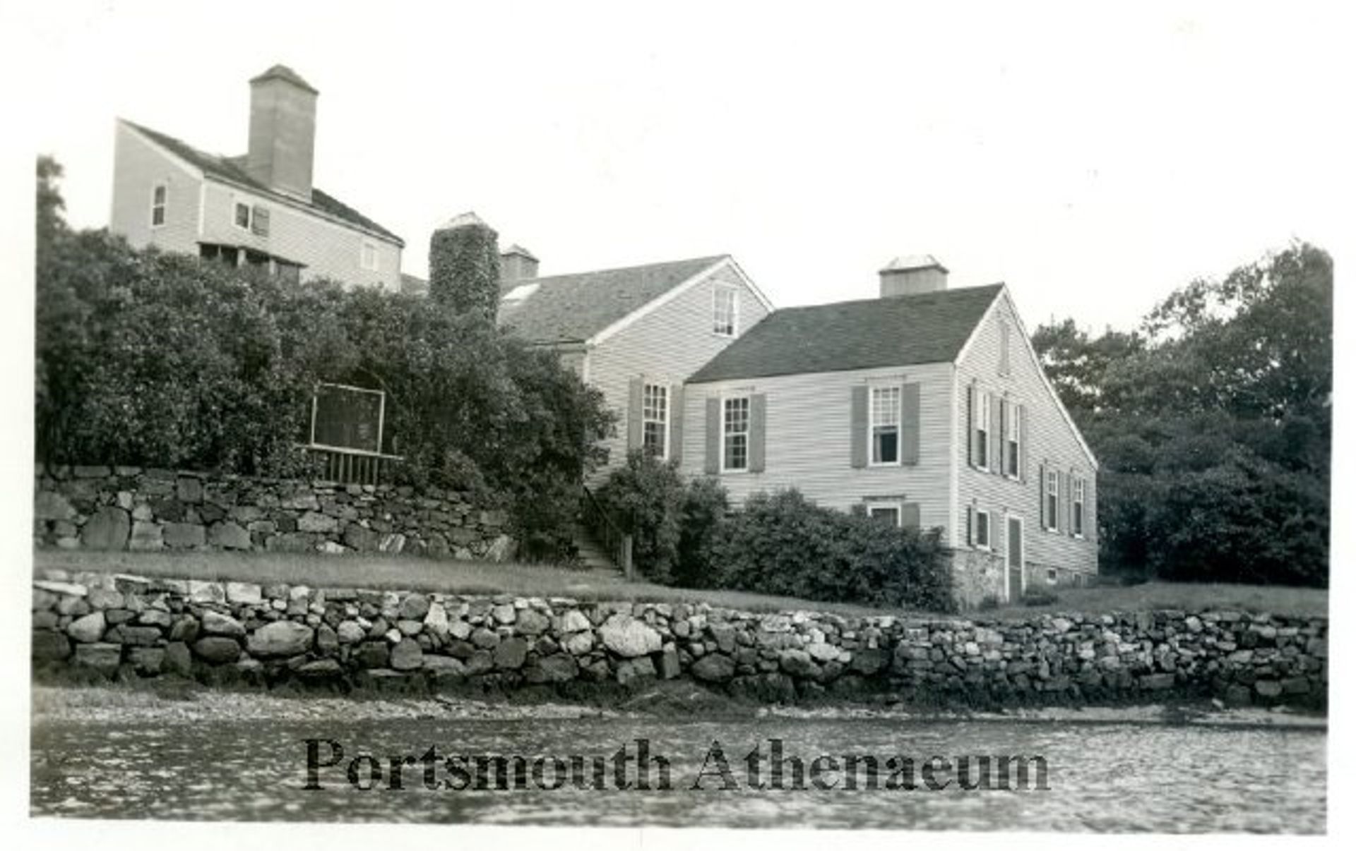 A black and white photo of the Wentworth Douglas house.