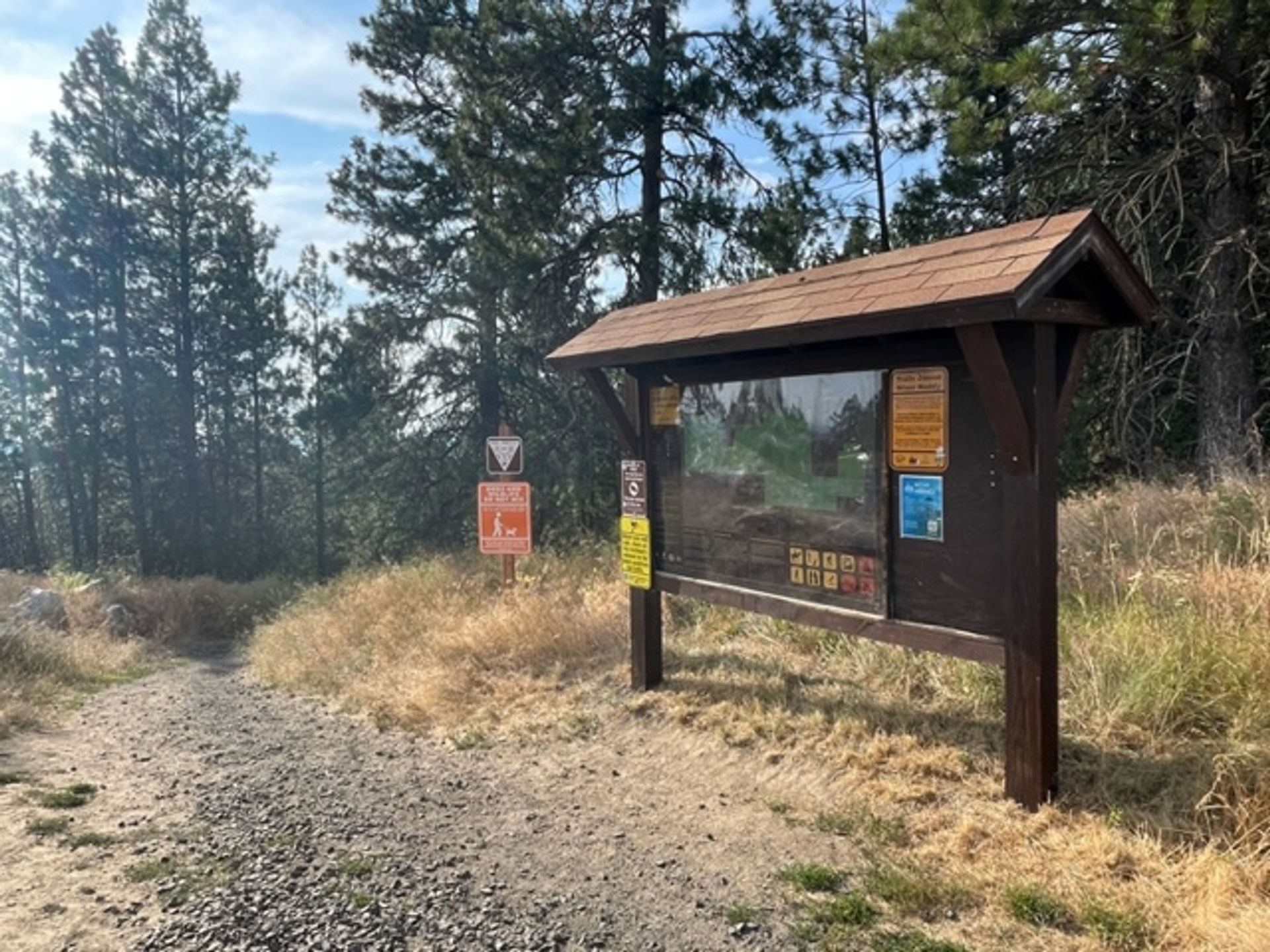 Trailhead kiosk and beginning of natural surface trail