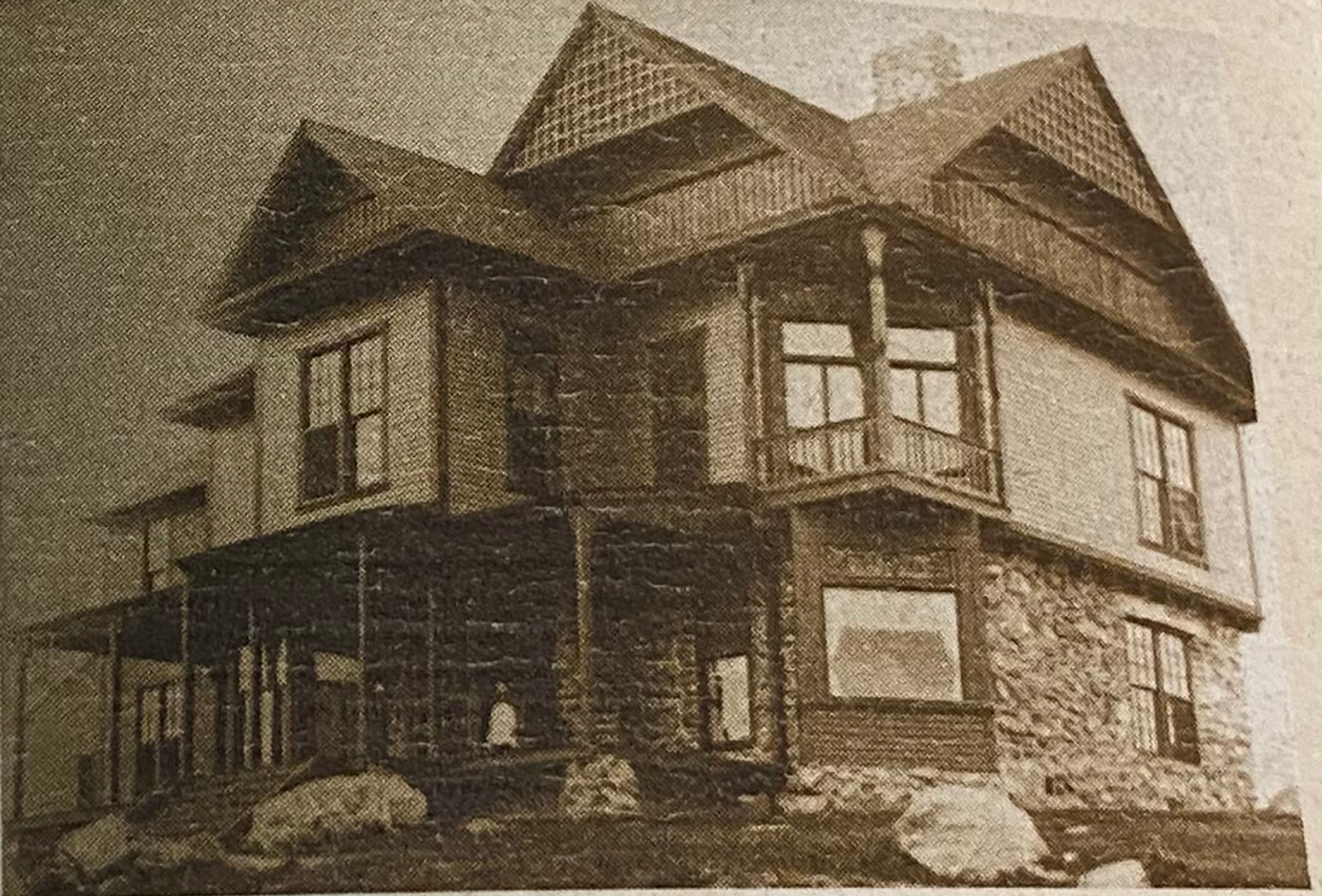 A black and white photo of the Big House.