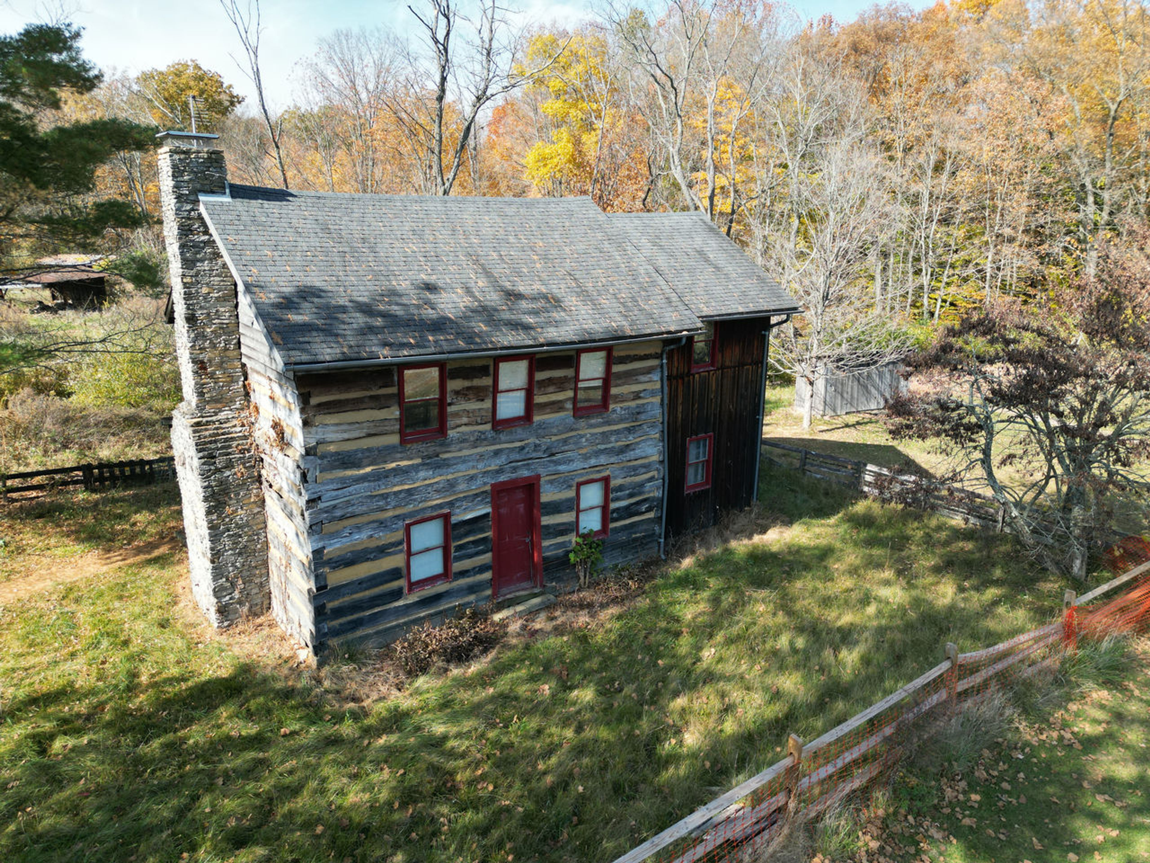 Two story log cabin in the woods at Caesar Creek State Park.