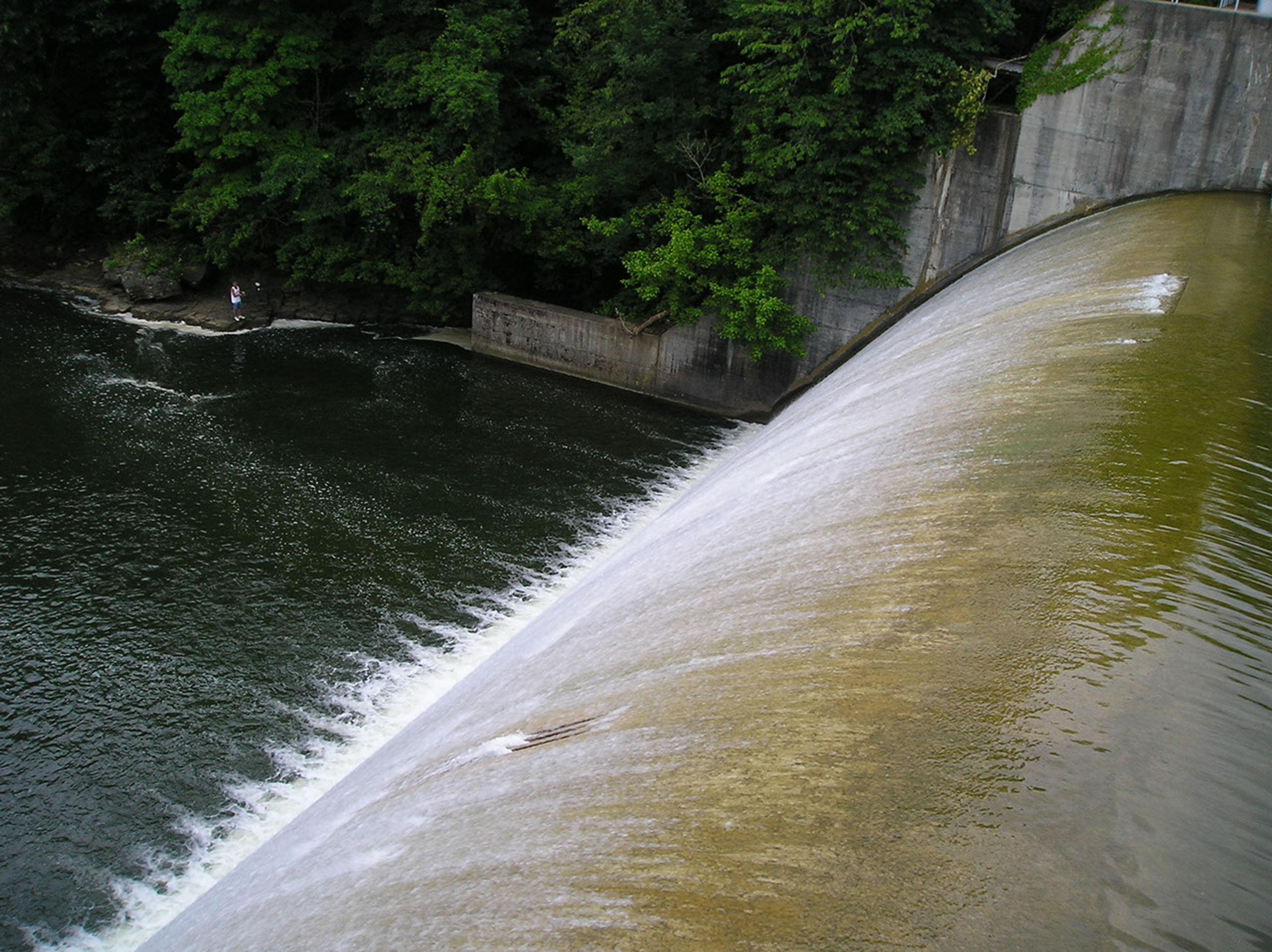 Water flowing over a dam at Forked Run State Park