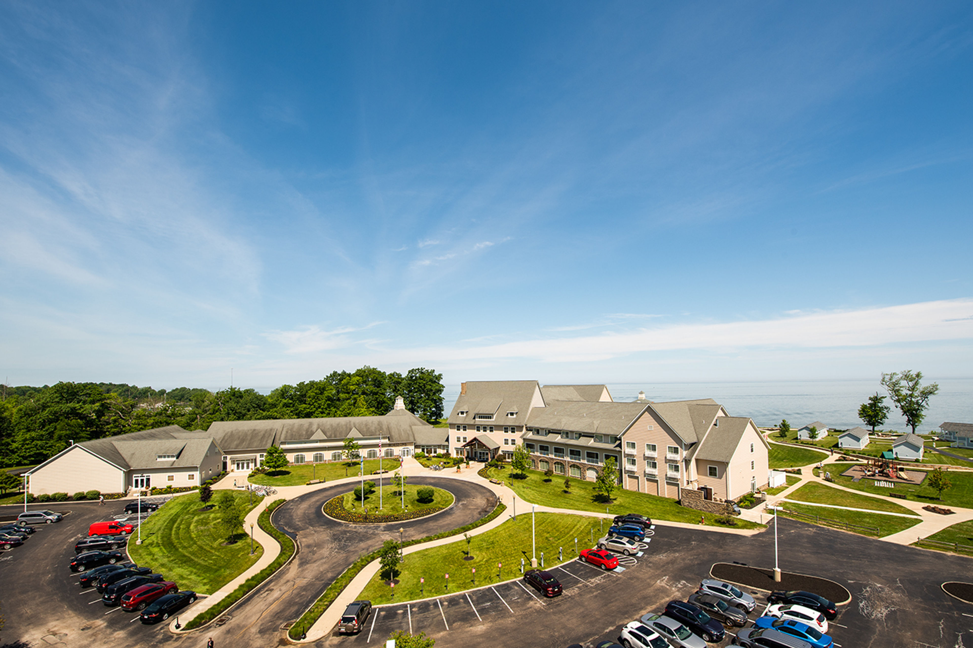 Aerial view of front of Geneva State Park Lodge and the parking lot