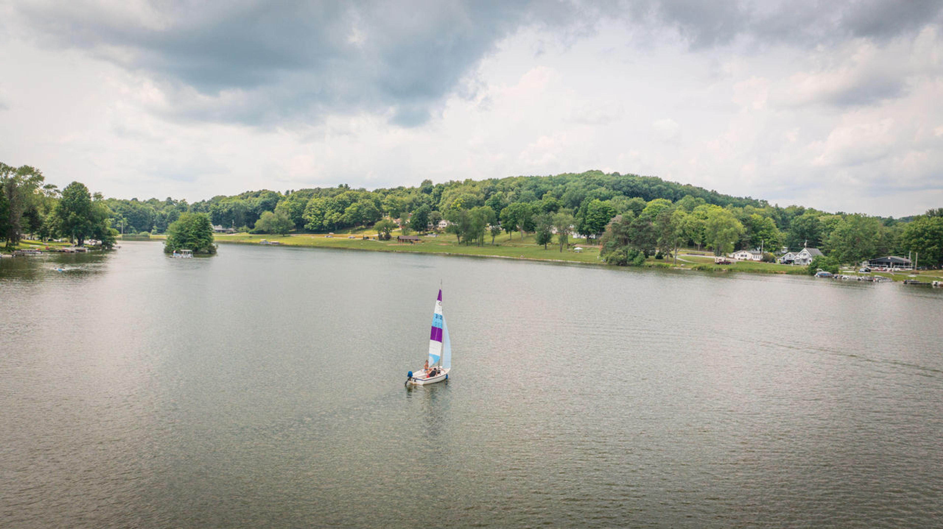 A sailboat on a lake at Guilford Lake State Park