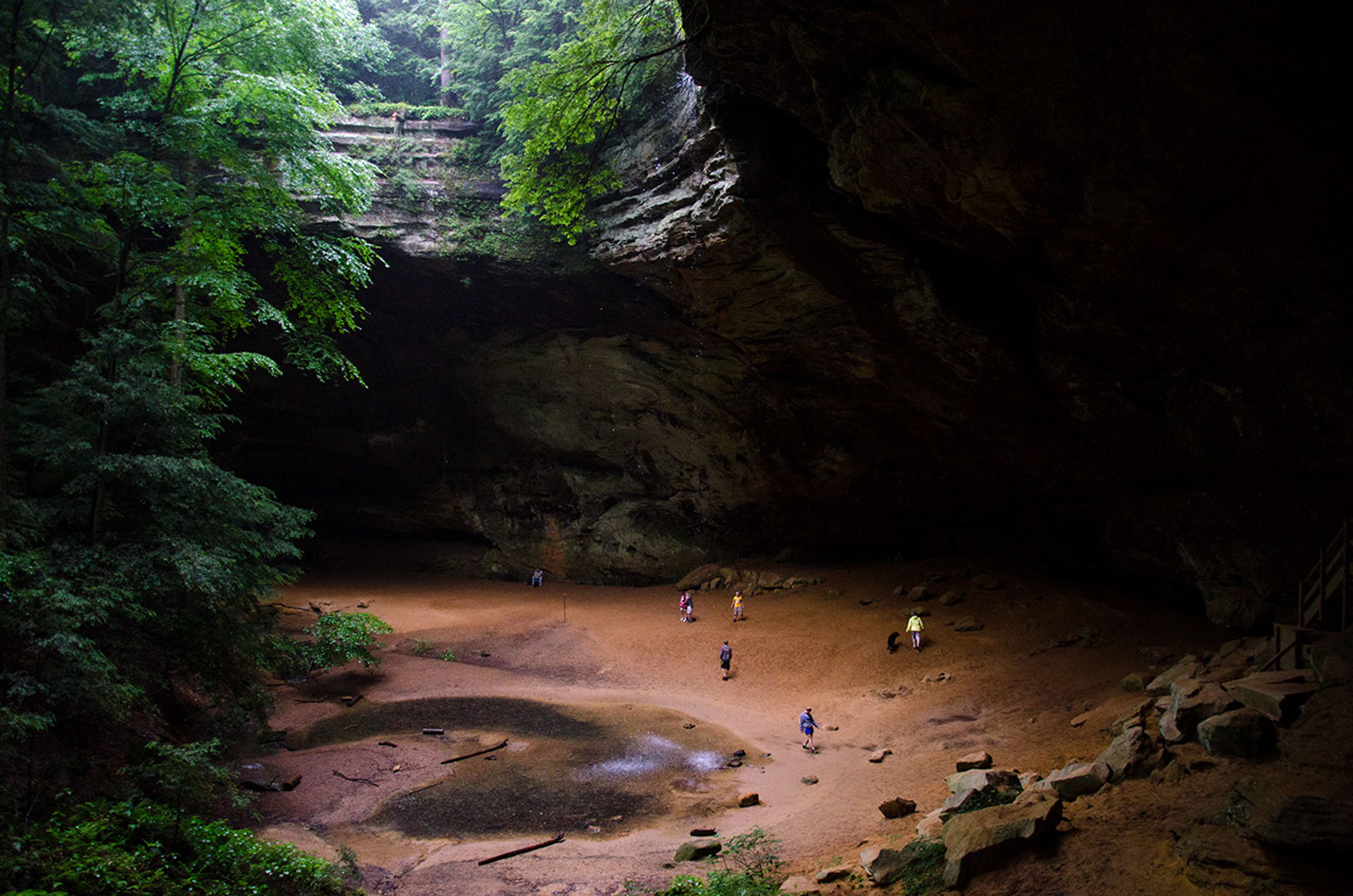 A group of people in a cave at Hocking Hills State Park