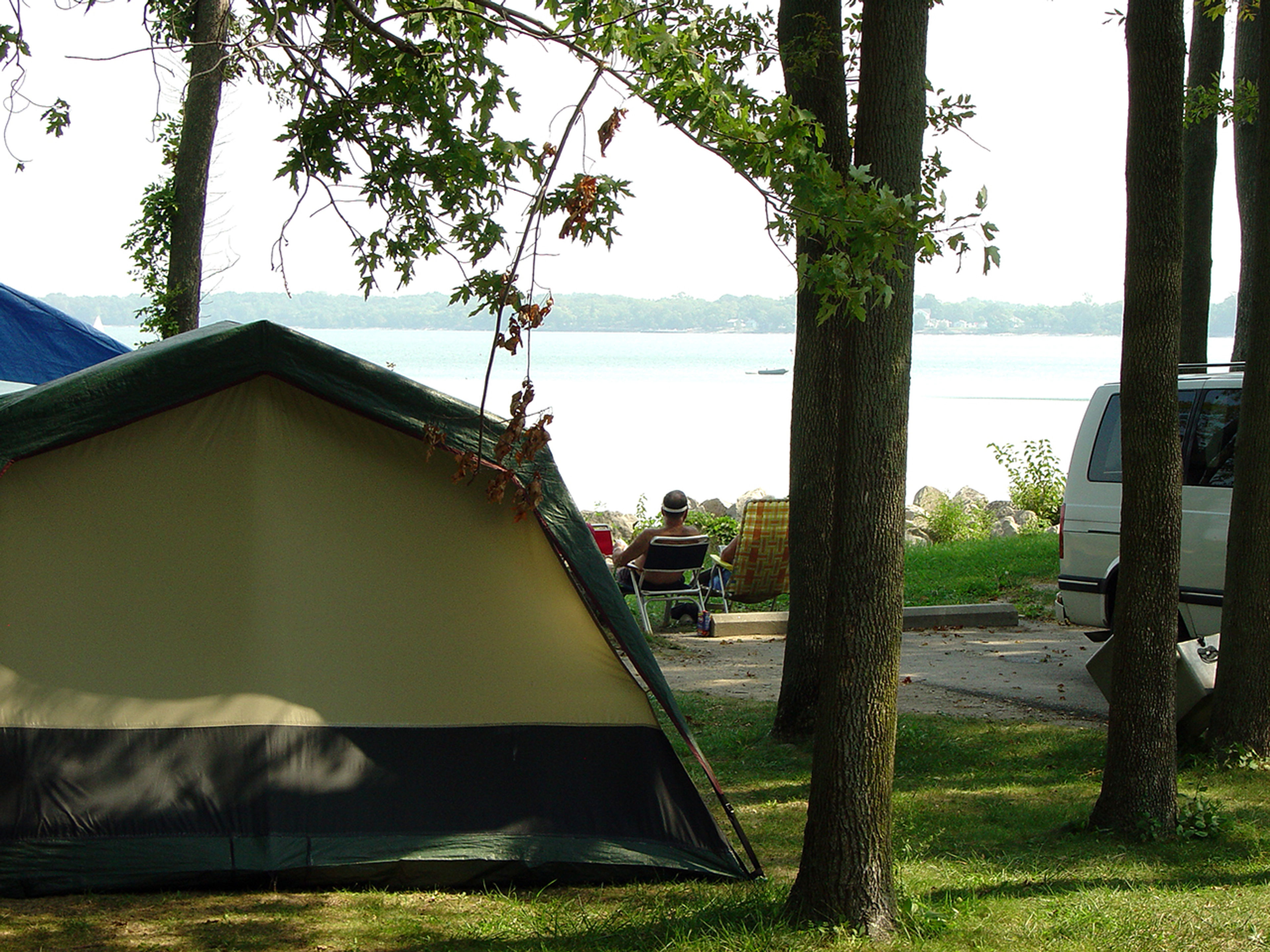 Small campsite near a body of water at Kelleys Island State Park