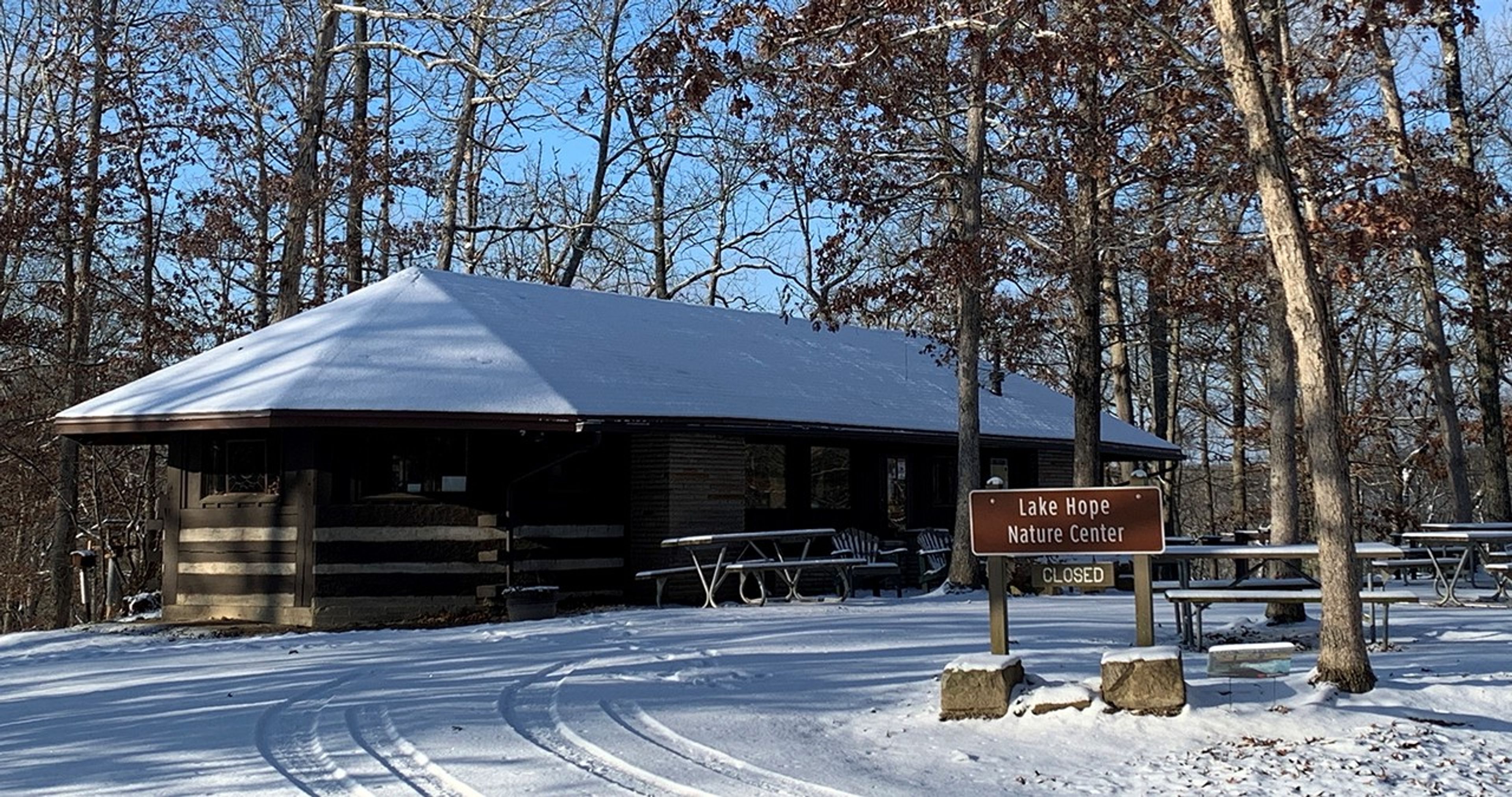 The nature center in the snowy woods at Lake Hope State Park