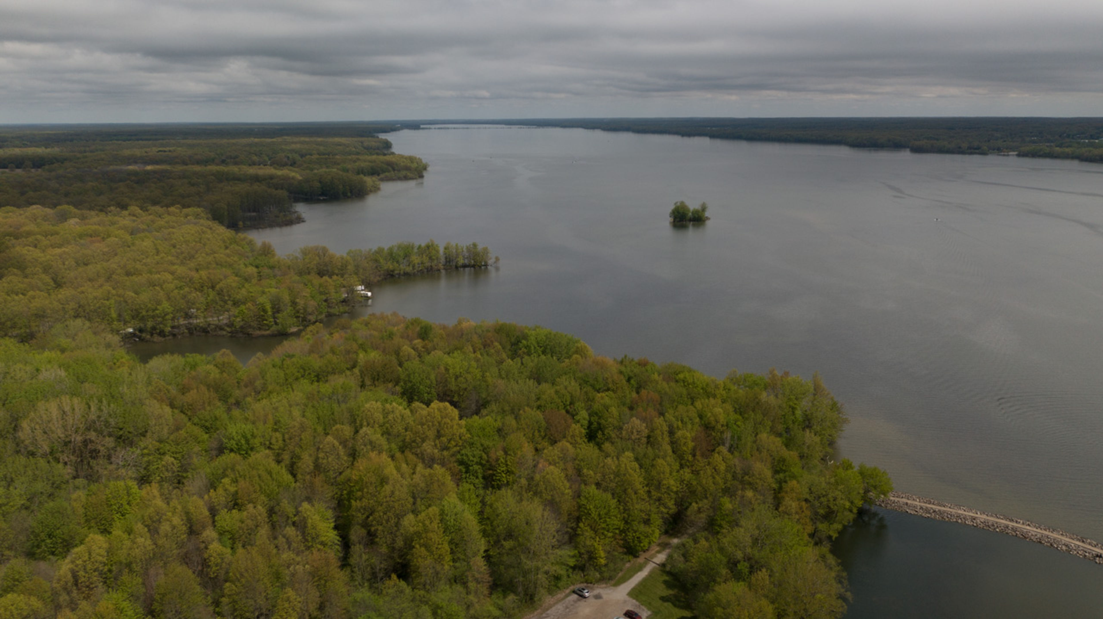 Aerial view of a body of water with trees at Mosquito Lake State Park