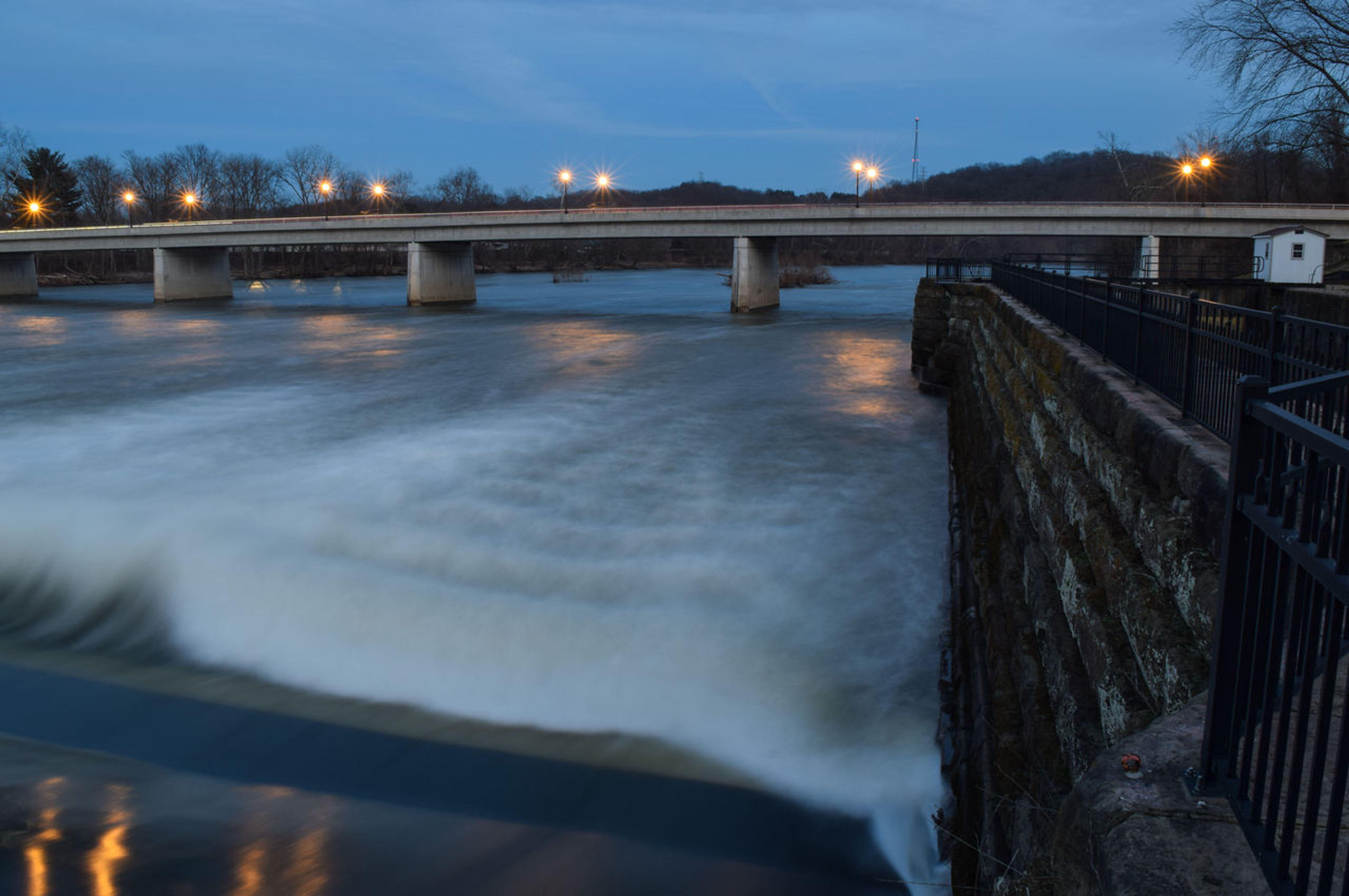 A bridge over a moving river at Muskingum River State Park