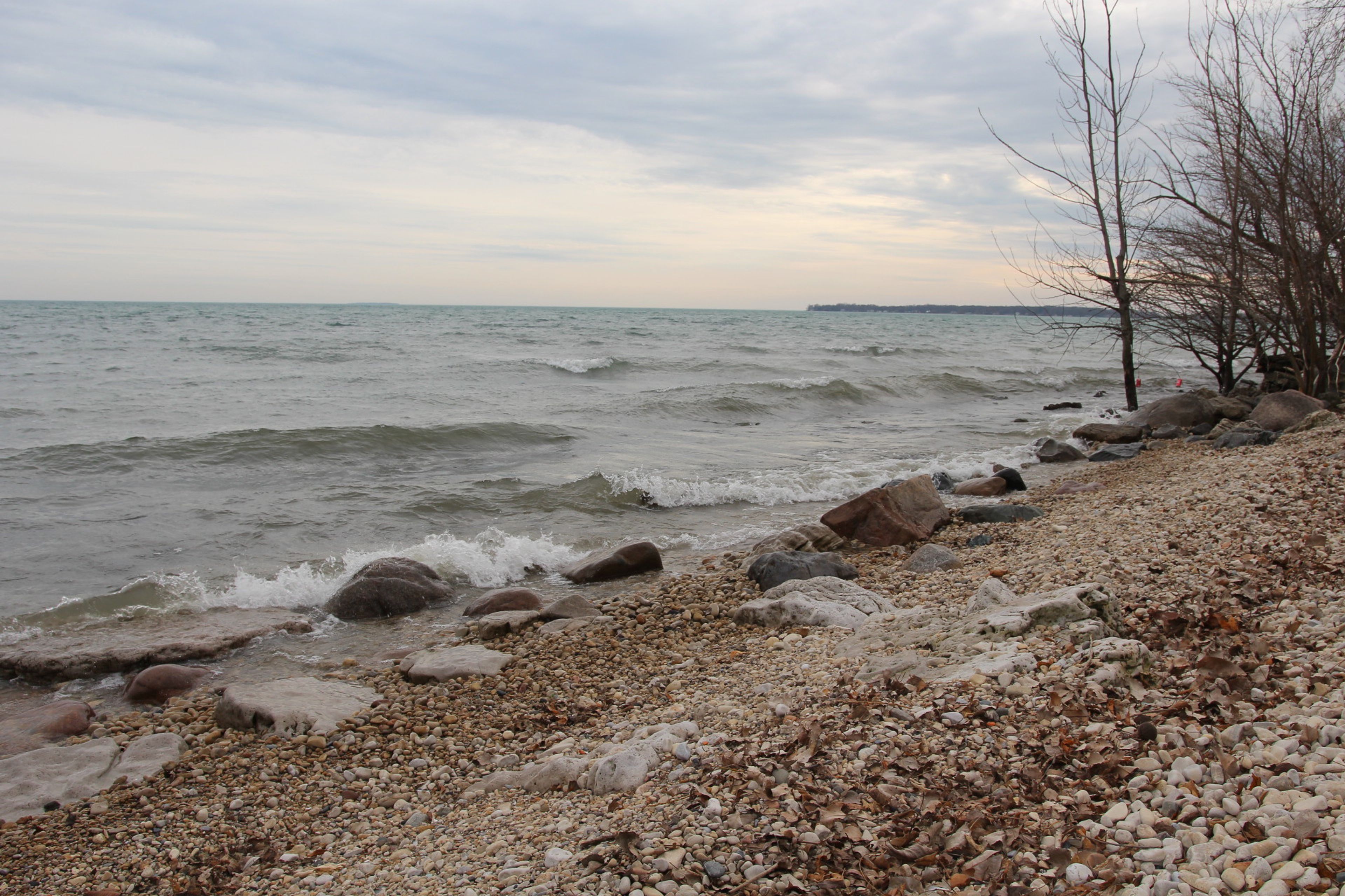 Waves crashing on a rocky beach at North Bass Island State Park