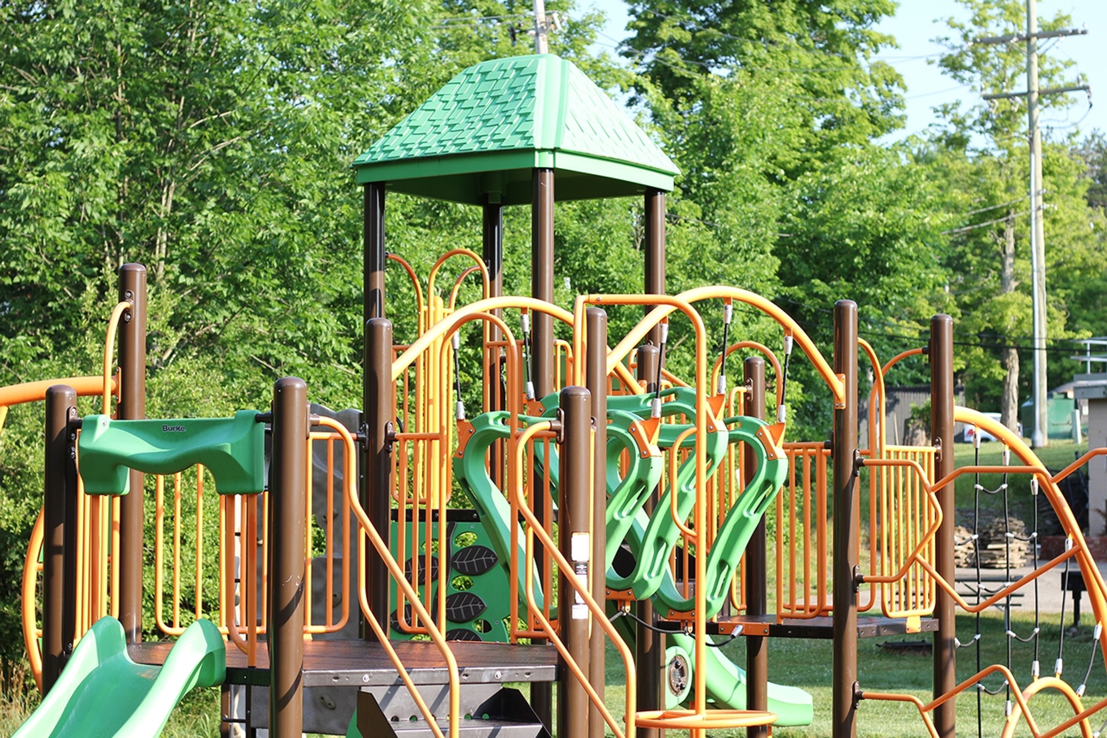 Orange, green, and brown playground at Punderson State Park