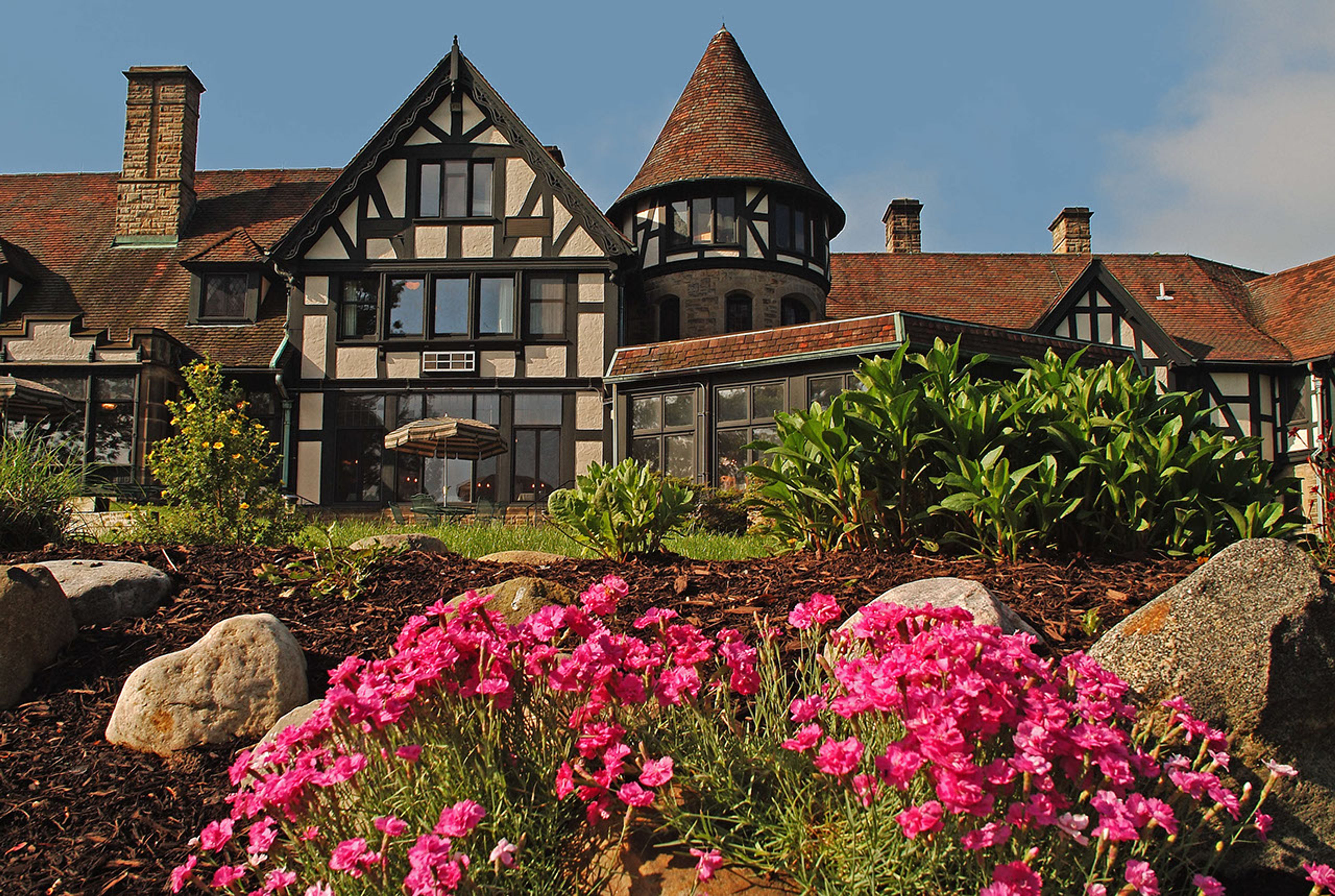 Exterior view of manor from the garden at Punderson State Park