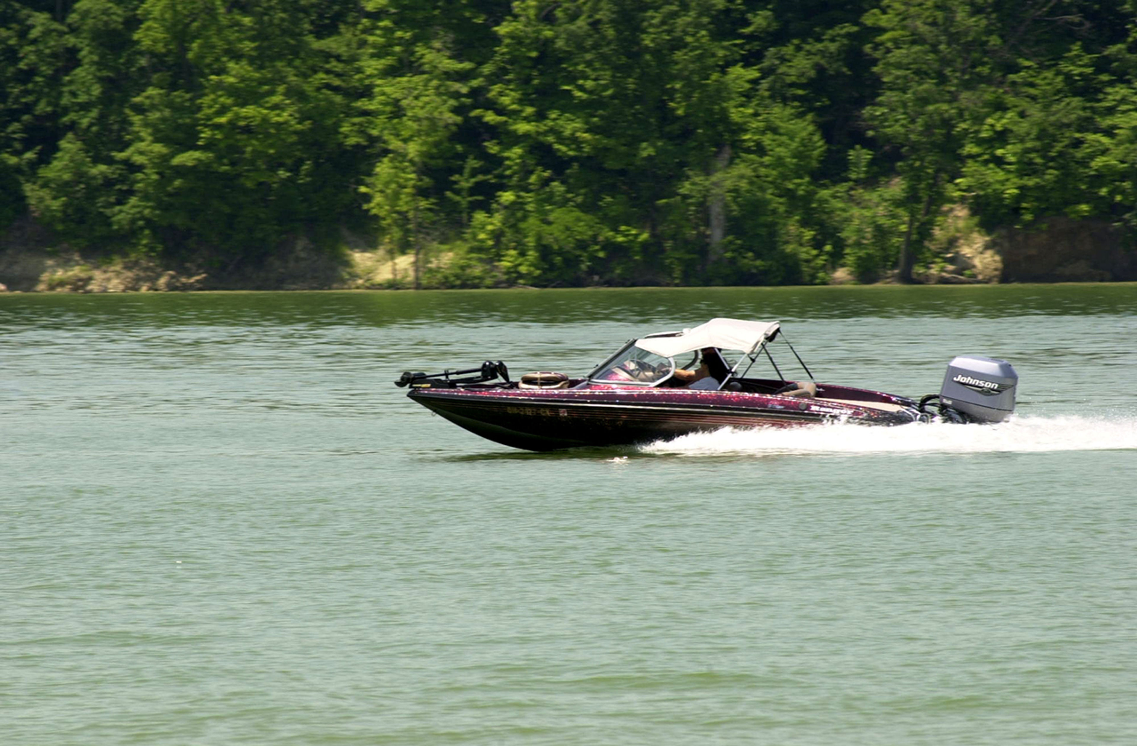 Speedboat driving on a body of water at West Branch State Park