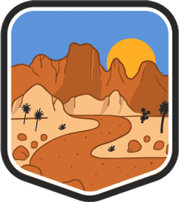 An illustrated badge for the Arizona community depicting a desert scene with red rock formations under a vibrant blue sky.