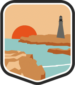 An illustrated badge for the Maine community showing a lighthouse on a rocky coast with the ocean and a setting sun.