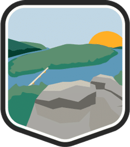 An illustrated badge for the Maryland community showing a river with rocks and green hills in the background.