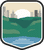 An illustrated badge for the New York community showing a forested city park with buildings surrounding it under a blue sky.