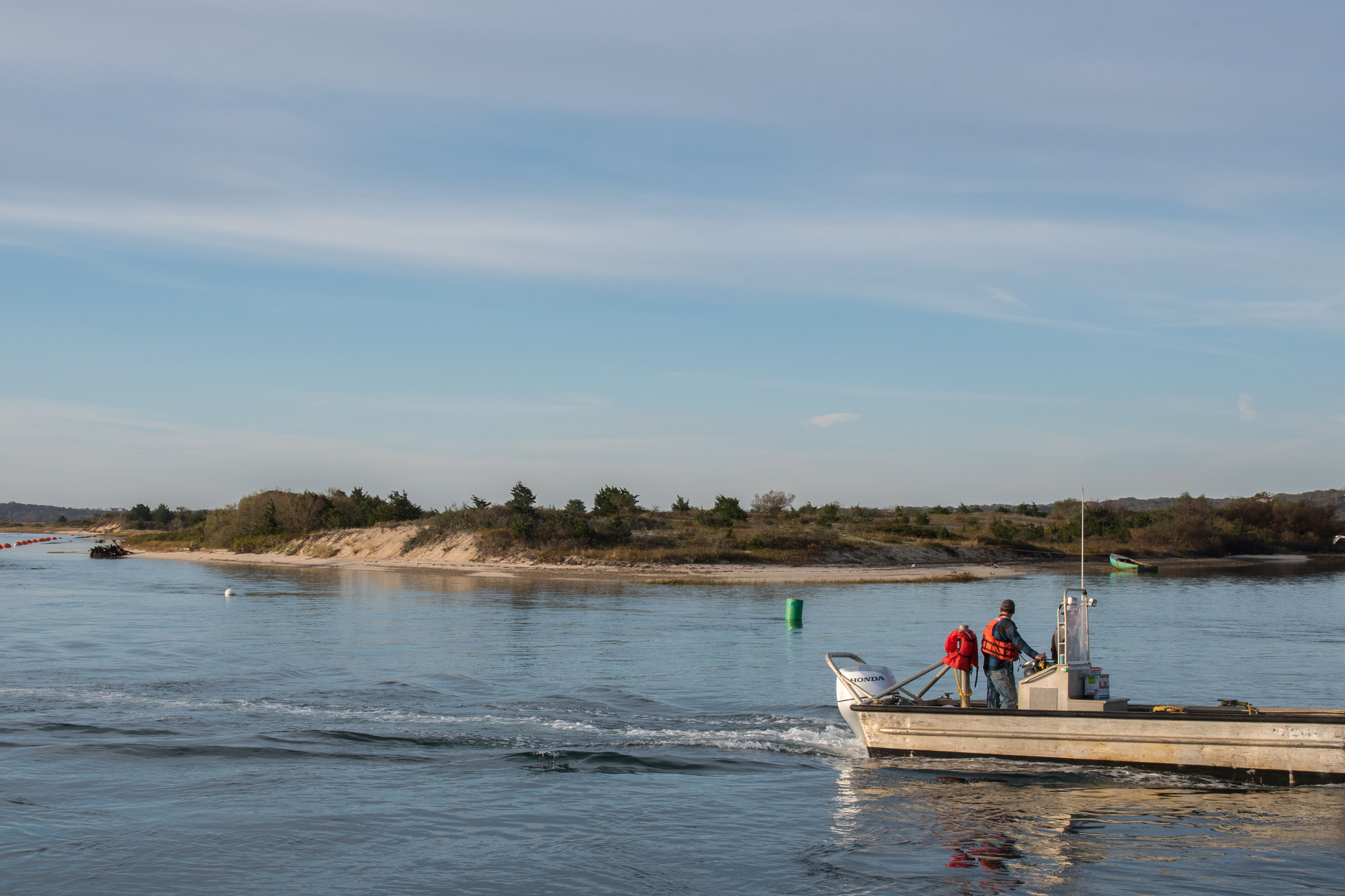 Fisherman passing Menemsha Neck