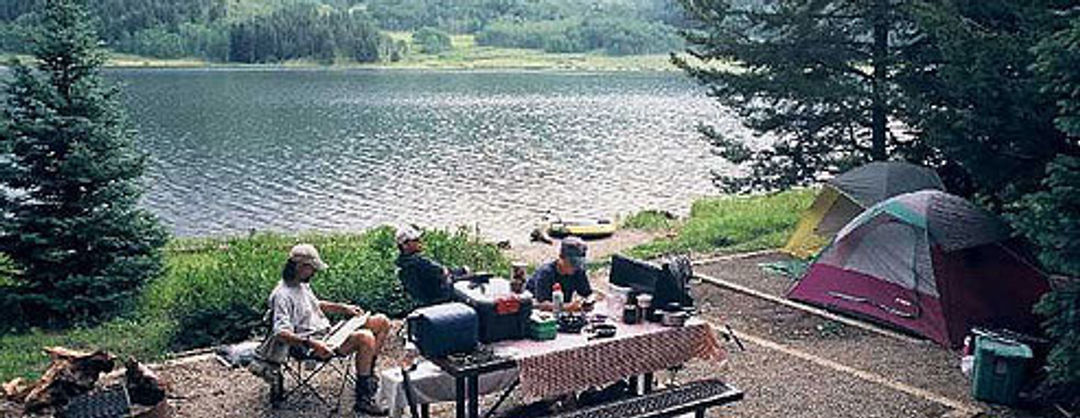 Camping and picknicking at a campsite on the shore of Boyd Lake.