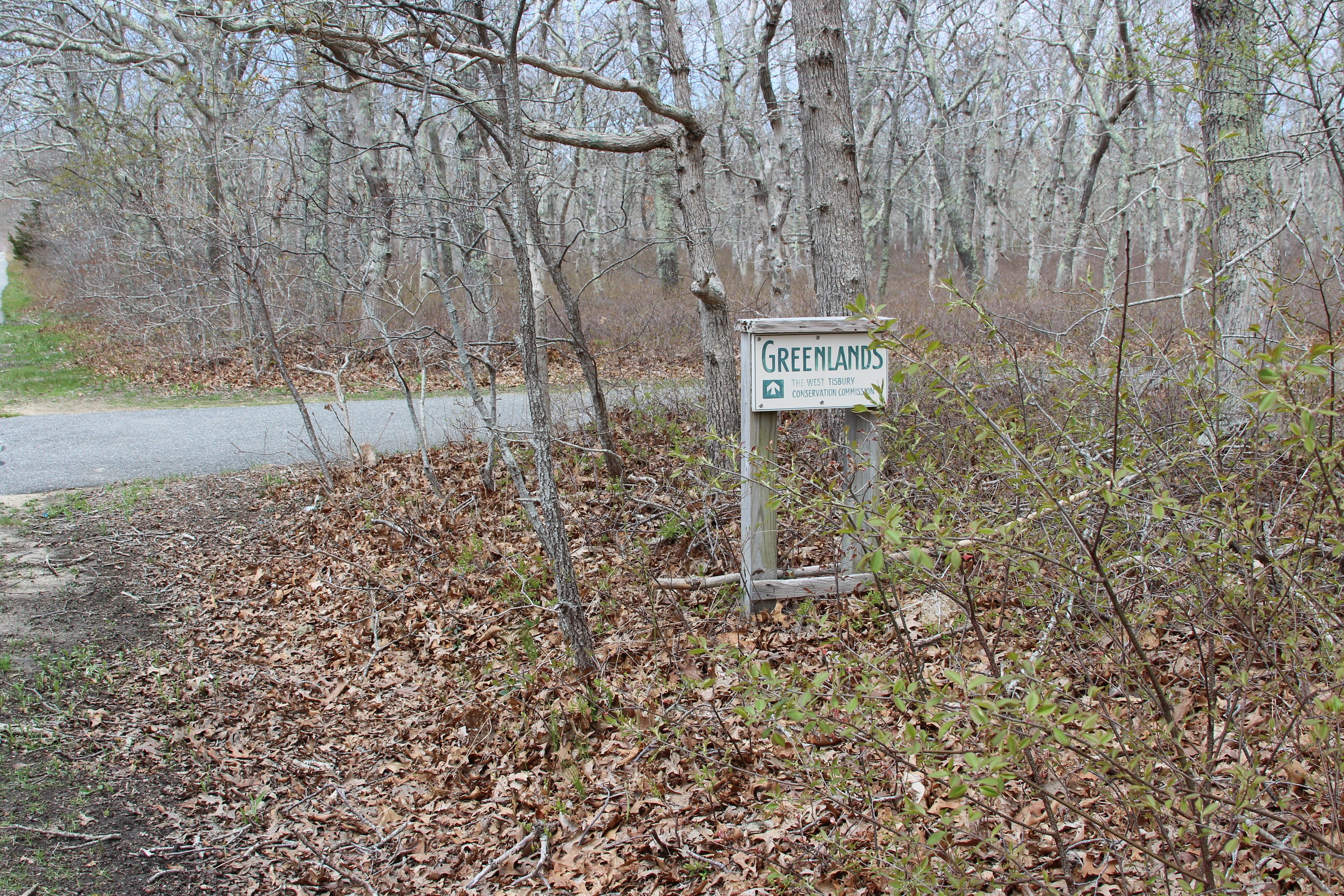 Greenlands sign by parking