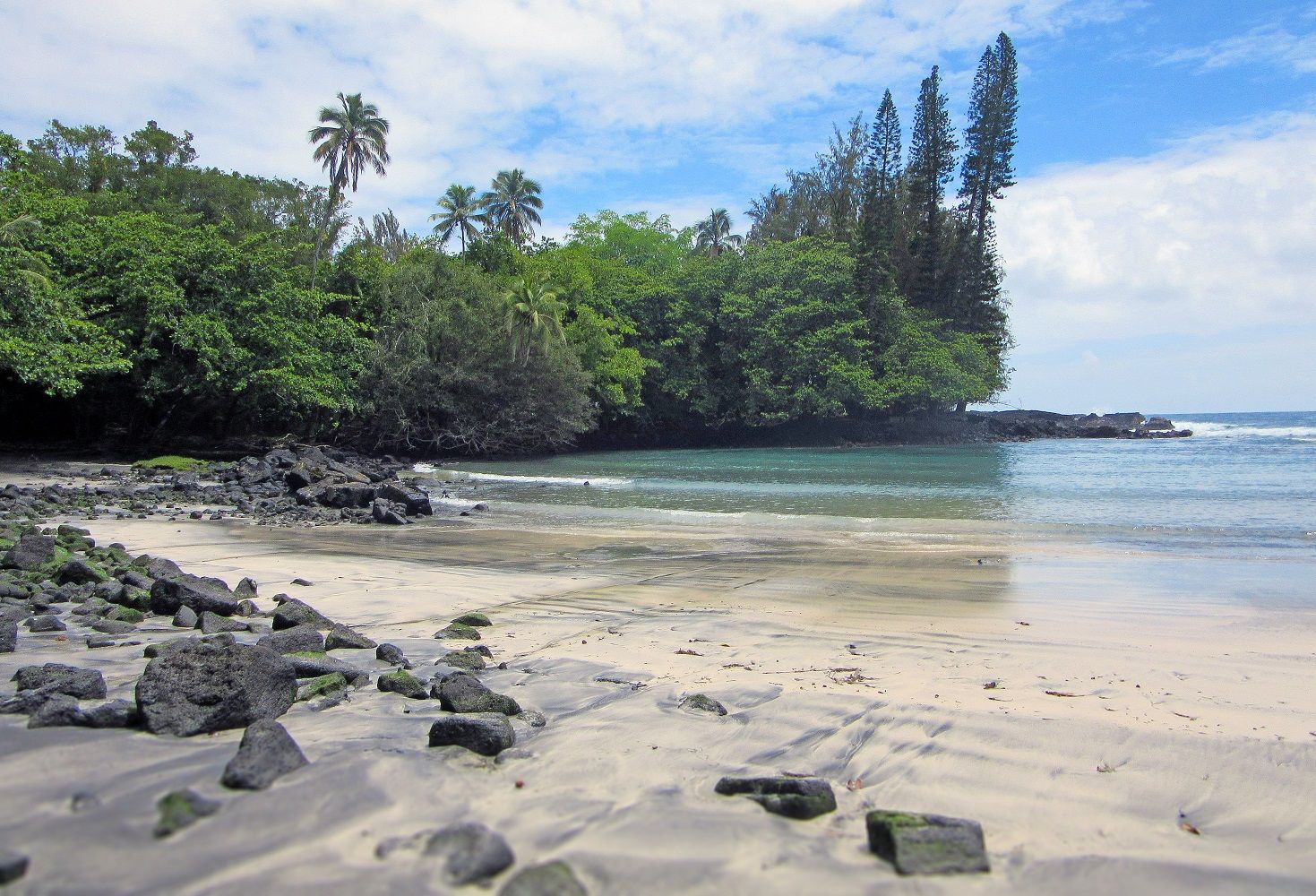 Hāʻena beach awaits the hiker at the trail's end.