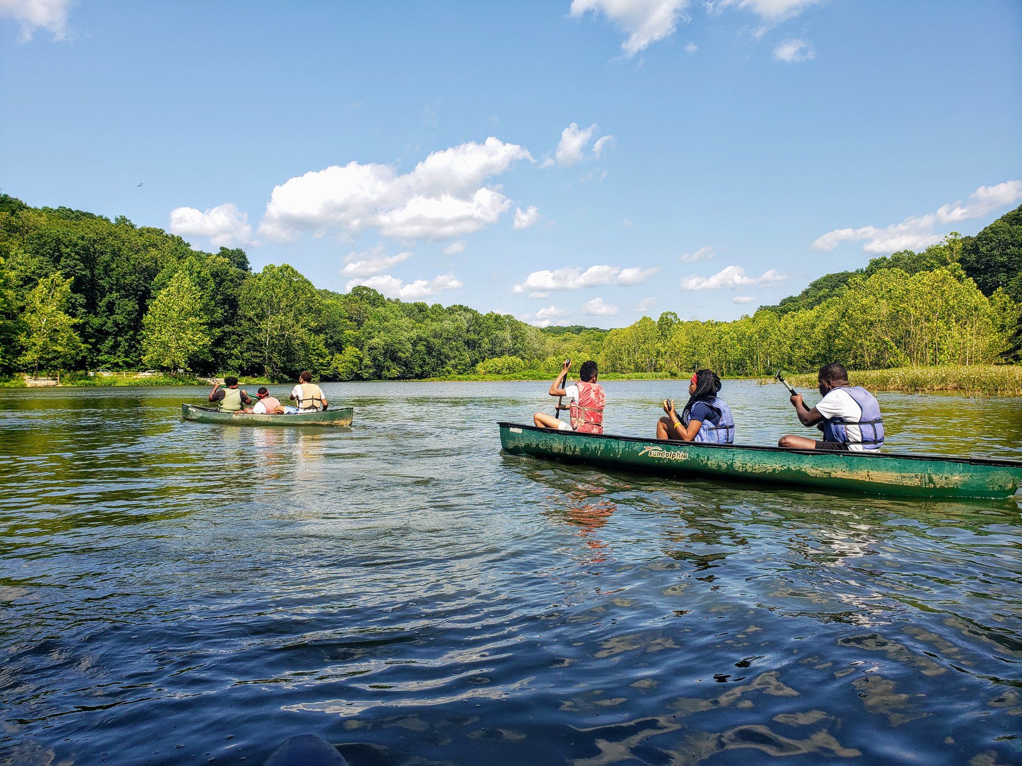 Park visitors enjoy a canoe paddle on Griffy Lake.