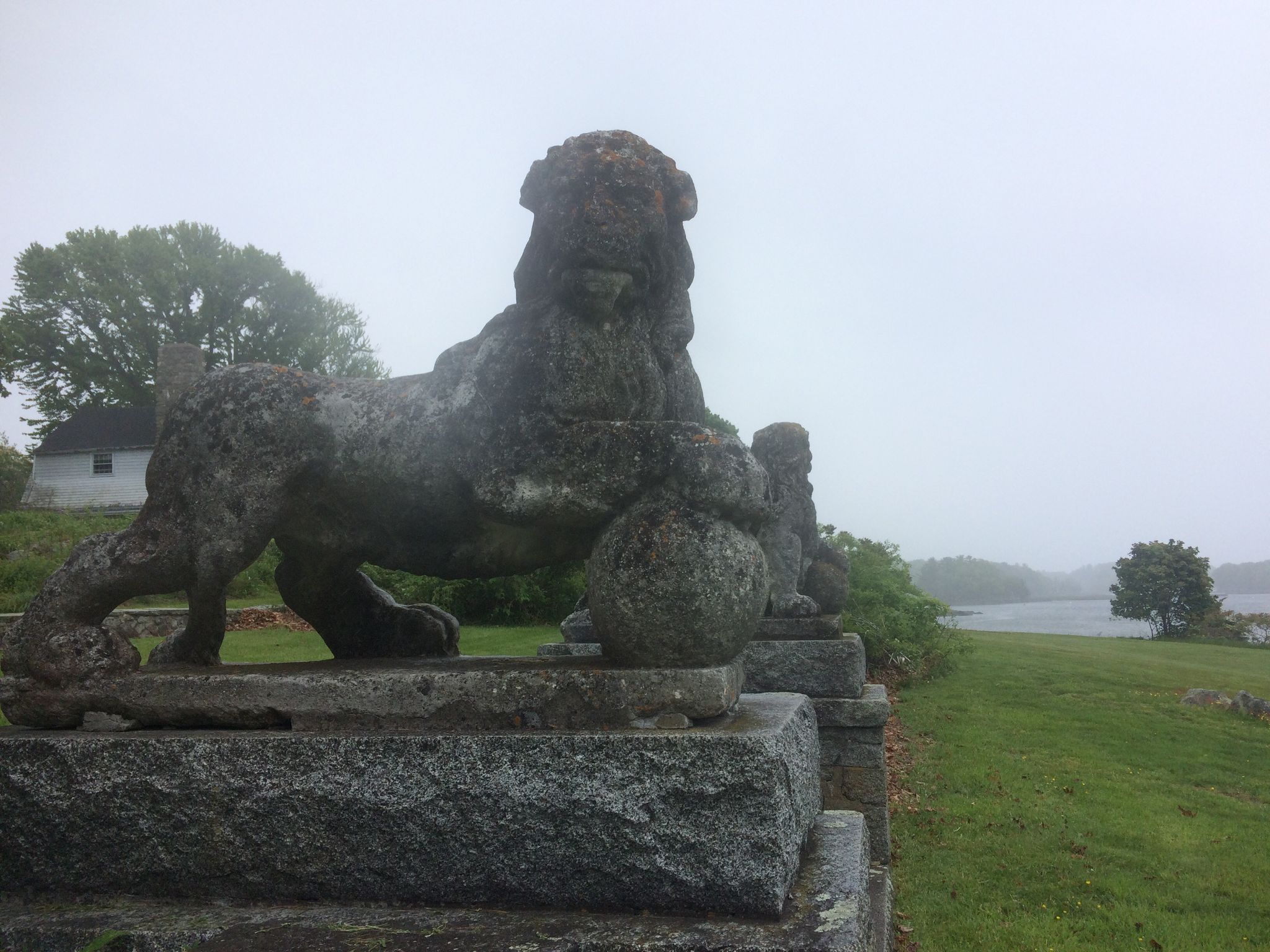 Stone lions guard the Carey Cottage.