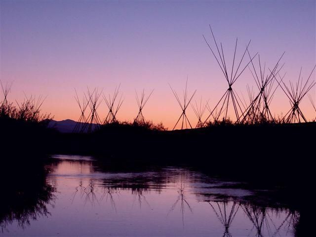 Today tepee poles stand sentinel at the site of August 9th, 1877 dawn attack at the Big Hole.